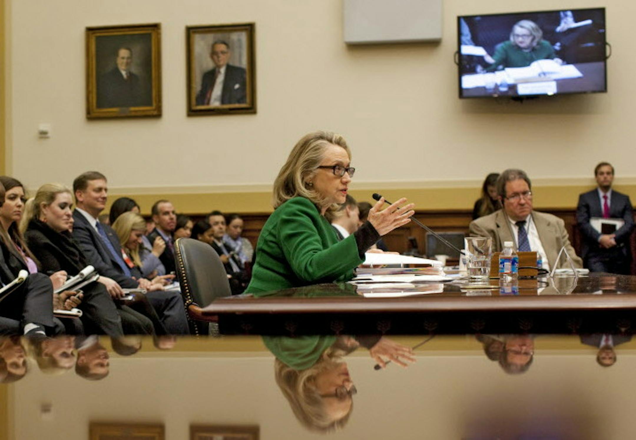 **EMBARGO: No electronic distribution, web posting or street sales before Monday at 3:30 a.m. ET, Mar. 23, 2015. No exceptions for any reasons. EMBARGO set by source.** FILE -- Secretary of State Hillary Clinton testifies to the House Committee on Foreign Affairs about the attack on the U.S. Embassy in Benghazi, Libya, in Washington, Jan. 22, 2013. (Christopher Gregory/The New York Times)
