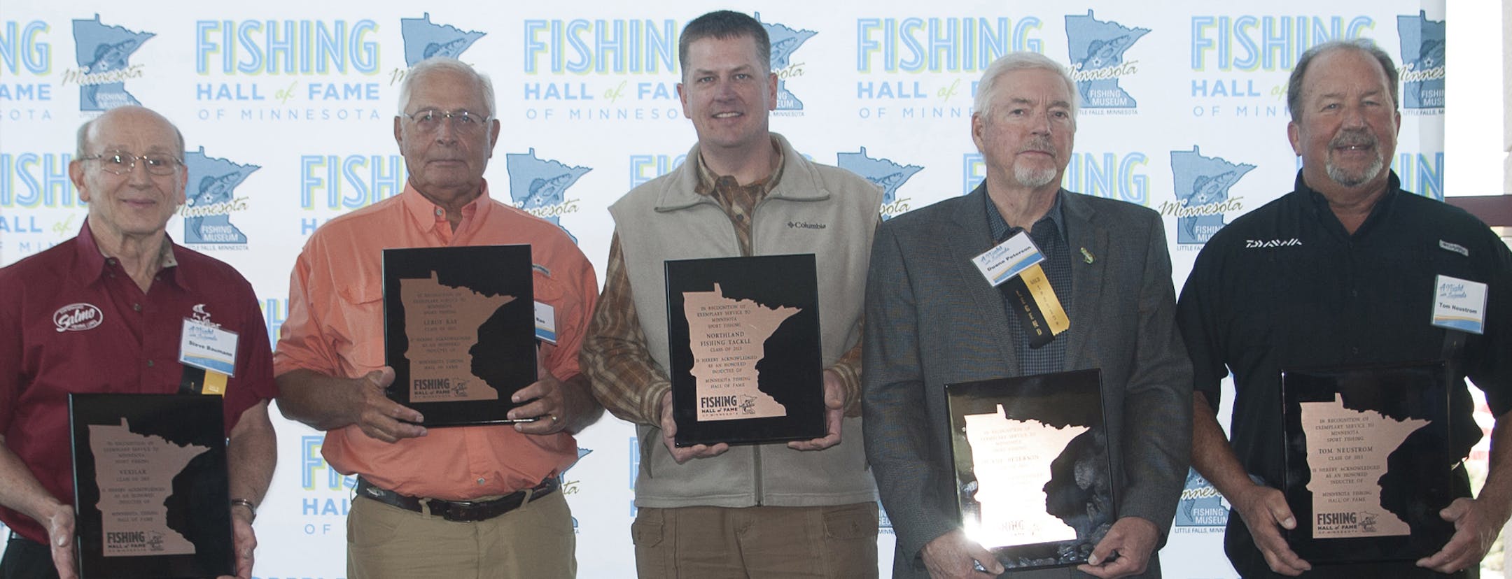 Three legendary anglers and two storied fishing companies were induced into the Fishing Hall of Fame of Minnesota over the weekend at the Northwest Sportshow in Minneapolis. Left to right: Steve Baumann of Vexilar Inc., guide LeRoy Ras, Eric Naig of Northland Fishing Tackle, Duane Peterson, pro-angler and co-founder of Northland Tackle, and veteran guide Tom Neustrom. Photo by Melissa Fruechte