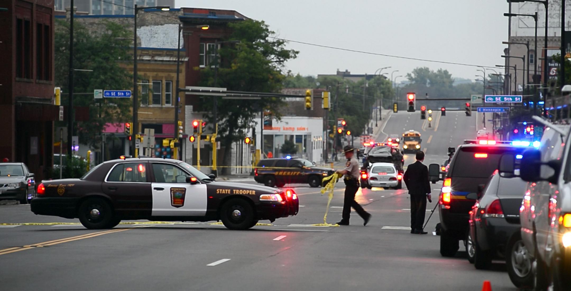 A suspected drunken driver fleeing the State Patrol crashed into another car and killed that vehicle&#x2019;s driver early Monday in Minneapolis, authorities said. The crash occurred shortly before 1 a.m. at Central Avenue and 4th Street SE., the patrol said. This is the view looking North on Central Ave. towards the crash site.]. Richard.Sennott@startribune.com Richard Sennott/Star Tribune Minneapolis Minnesota Monday 9/9/13) ** (cq)