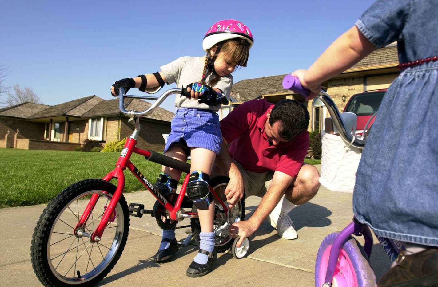 Removing the training wheels can be scary for kids and parents.