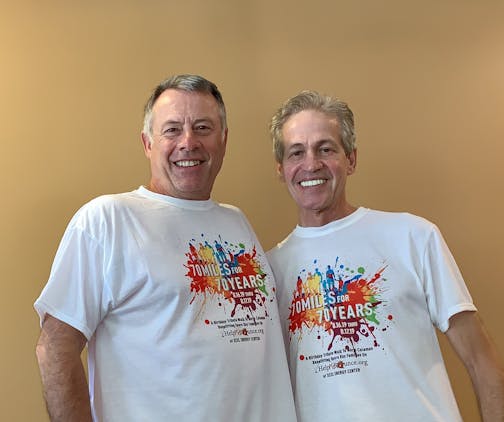 Erich Mische, left, plans to walk 70 miles in honor of Norm Coleman's 70th birthday and as a fundraiser for the nonprofit Spare Key.