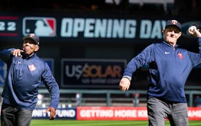 Minnesota recent hall of fame inductees Tony Oliva and Jim Kaat threw out the first pitch at Target Field during opening day events. Hill was murdere
