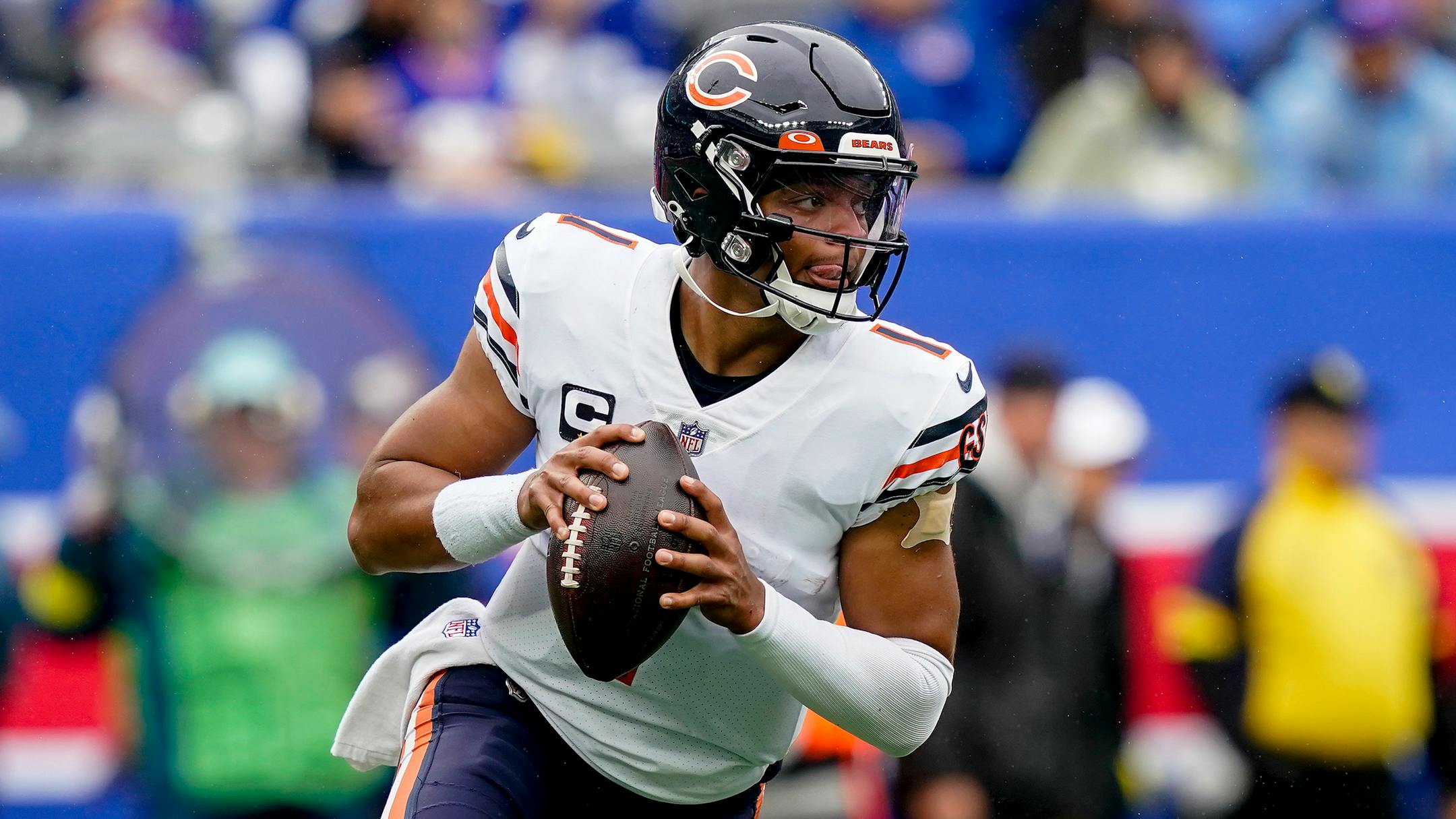 Chicago Bears quarterback Justin Fields (1) looks to pass against the New York Giants during the first quarter of an NFL football game, Sunday, Oct. 2, 2022, in East Rutherford, N.J. (AP Photo/John Minchillo)