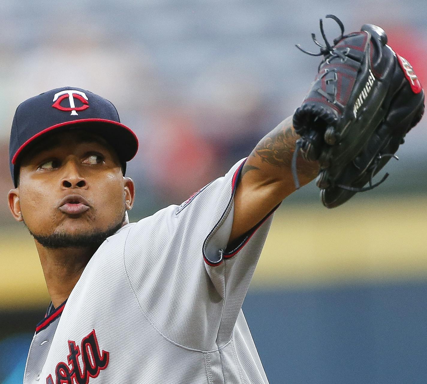 Minnesota Twins starting pitcher Ervin Santana works against the Atlanta Braves during the first inning of a baseball game in Atlanta, Tuesday, Aug. 16, 2016. Minnesota won 4-2. (AP Photo/John Bazemore)