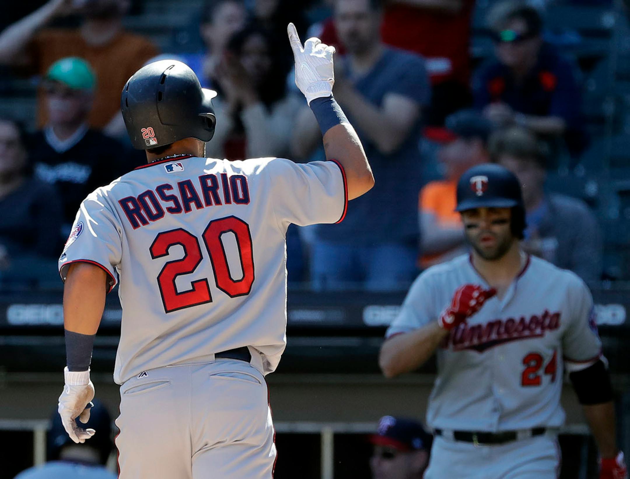 Minnesota Twins' Eddie Rosario celebrates after hitting a solo home run against the Chicago White Sox during the ninth inning of a baseball game Sunday, May 6, 2018, in Chicago. The Twins won 5-3.