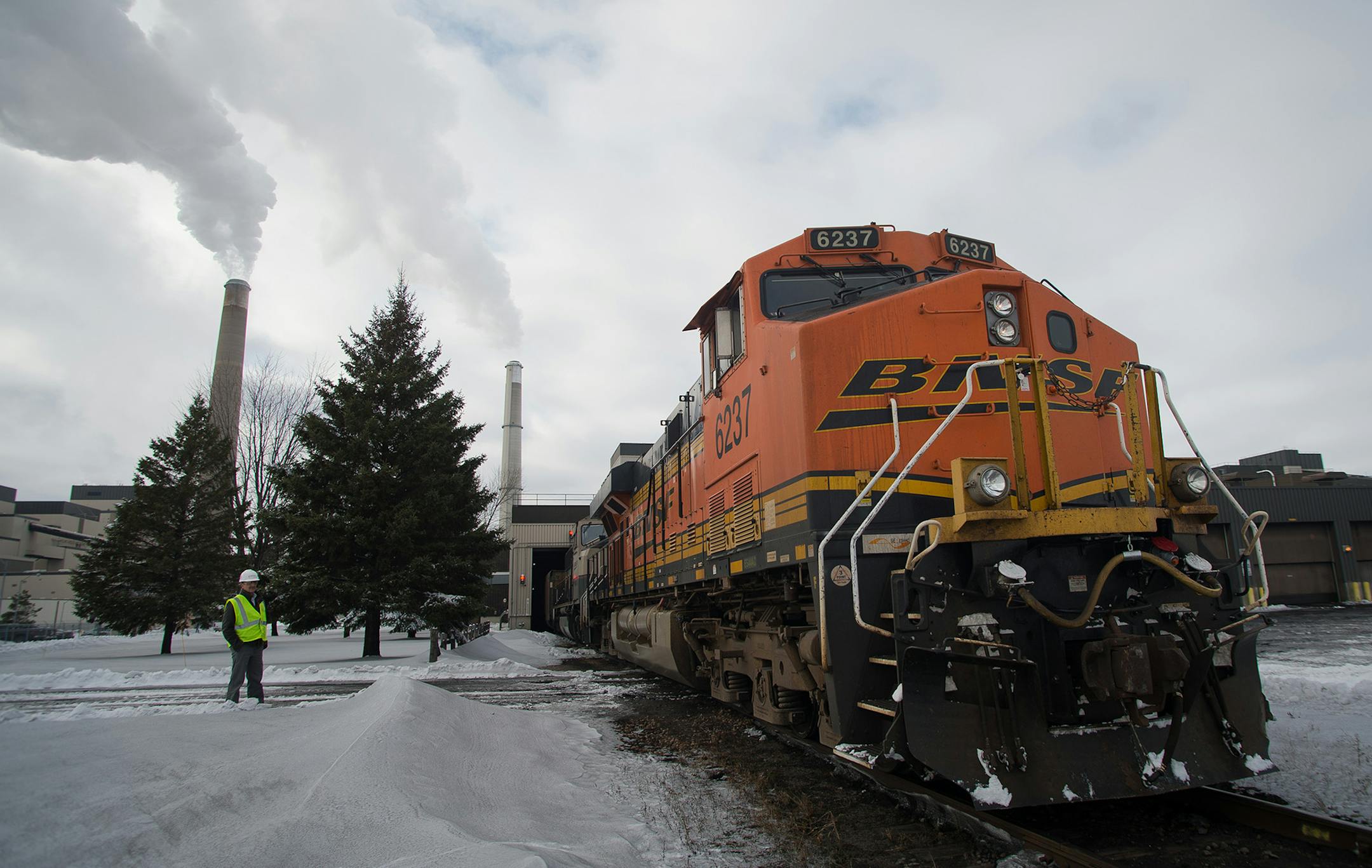 A locomotive pulls coal cars through the dumper station to be unloaded Wednesday at the Sherburne County Generating Station. Each train is roughly a mile long and consists of more than one hundred cars. AARON LAVINSKY &#xac;&#x2022; aaron.lavinsky@startribune.com Minnesota power companies have shuttered four smaller power plants and warn that supplies of coal to some of the largest, most important plants are dwindling as BNSF Railway's rail delivery problems persist. Photographs taken at Sherbur