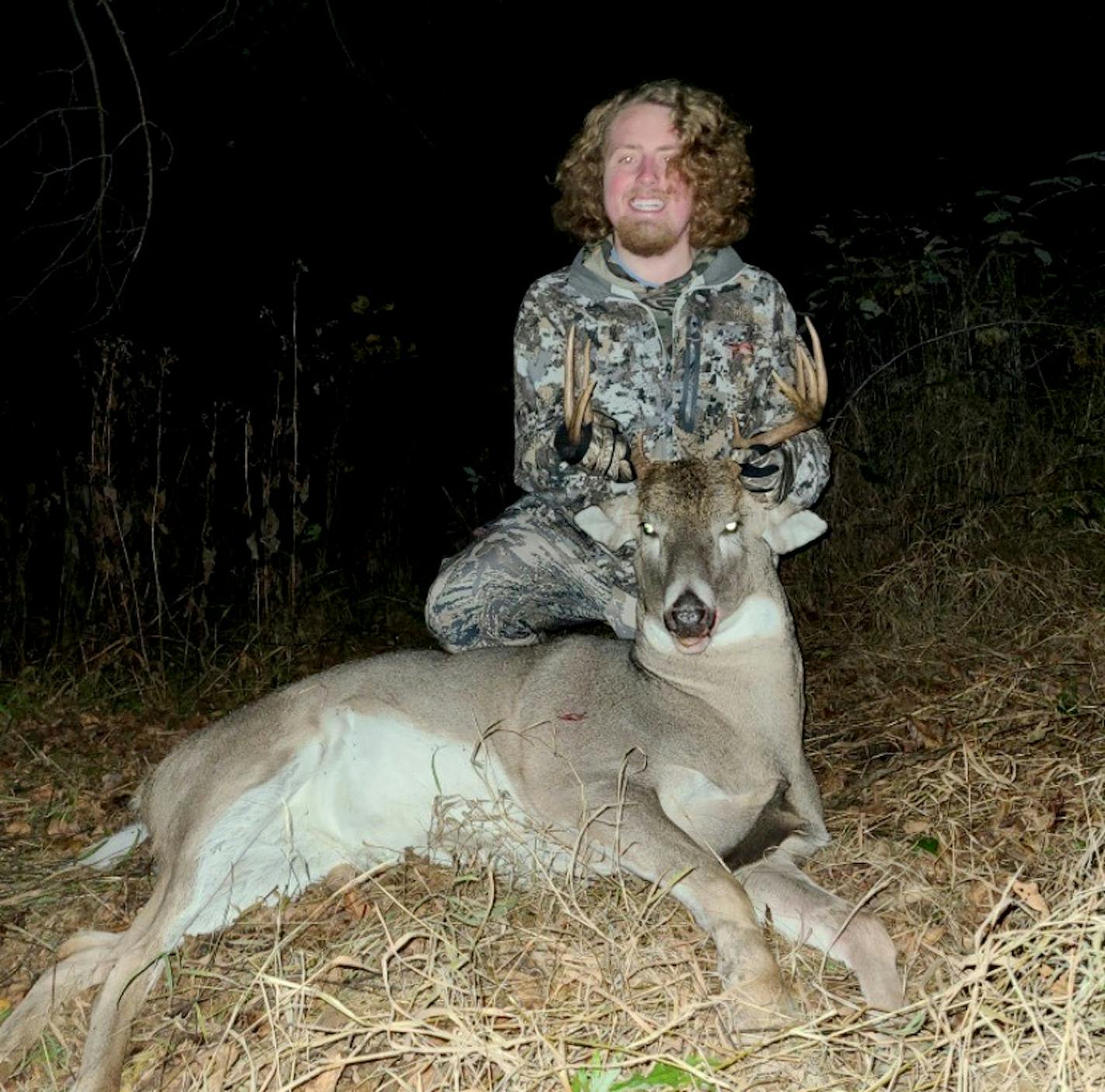 Josh Peterson, with his big buck.