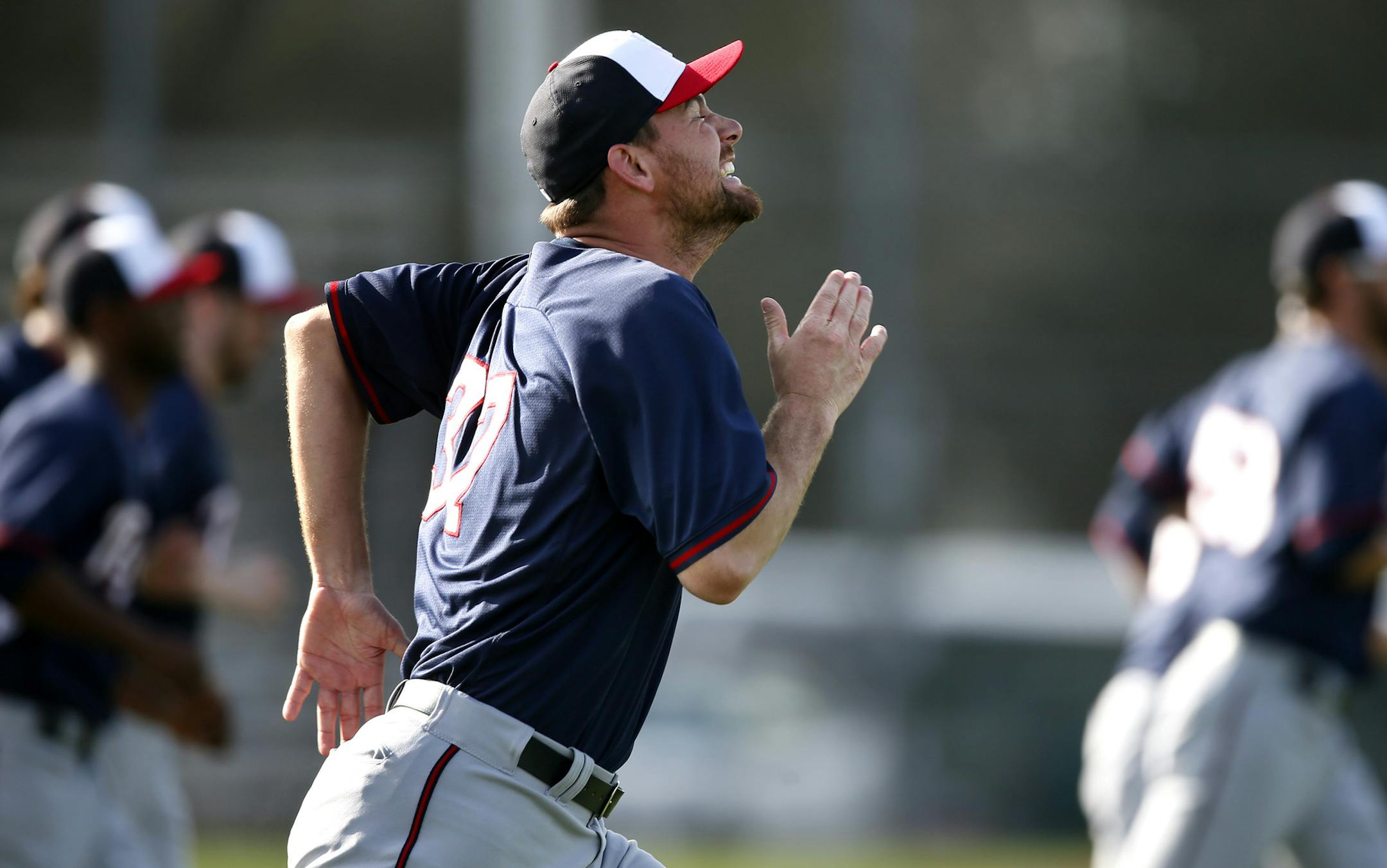 Twins pitcher Mike Pelfrey and teammates ran sprints during practice Friday Feb 21. 2014 in Fort Myers, Florida at Lee County Sports Complex. ] JERRY HOLT jerry.holt@startribune.com Jerry Holt