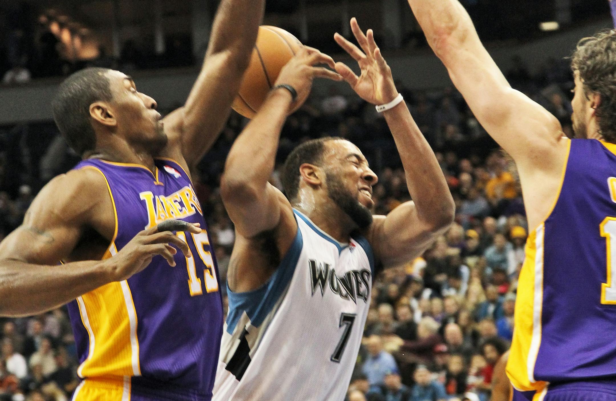 The Lakers defense knocked the ball away from the Wolves' Derrick Williams.