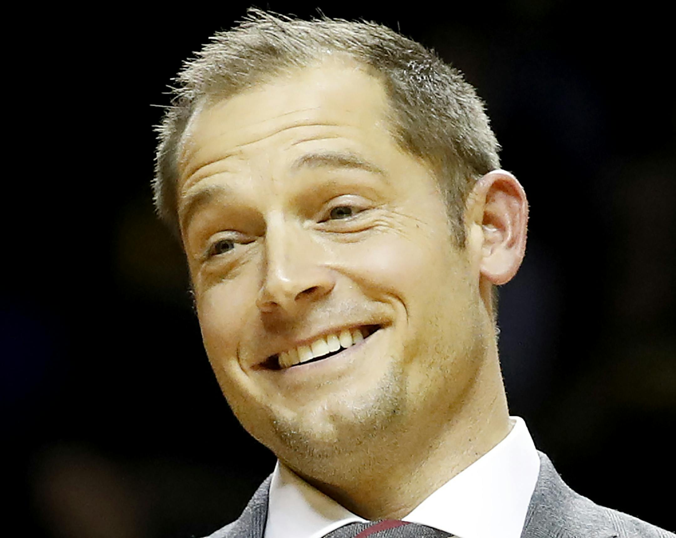 Minnesota Gophers head football coach P.J. Fleck addresses the crowd and helped the half time entertainment act Red Panda at William Arena. ] CARLOS GONZALEZ cgonzalez@startribune.com - January 8, 2017, Minneapolis, MN, Williams Arena, NCAA Basketball, University of Minnesota Gophers vs. Ohio State Buckeyes ORG XMIT: MIN1701081947460467