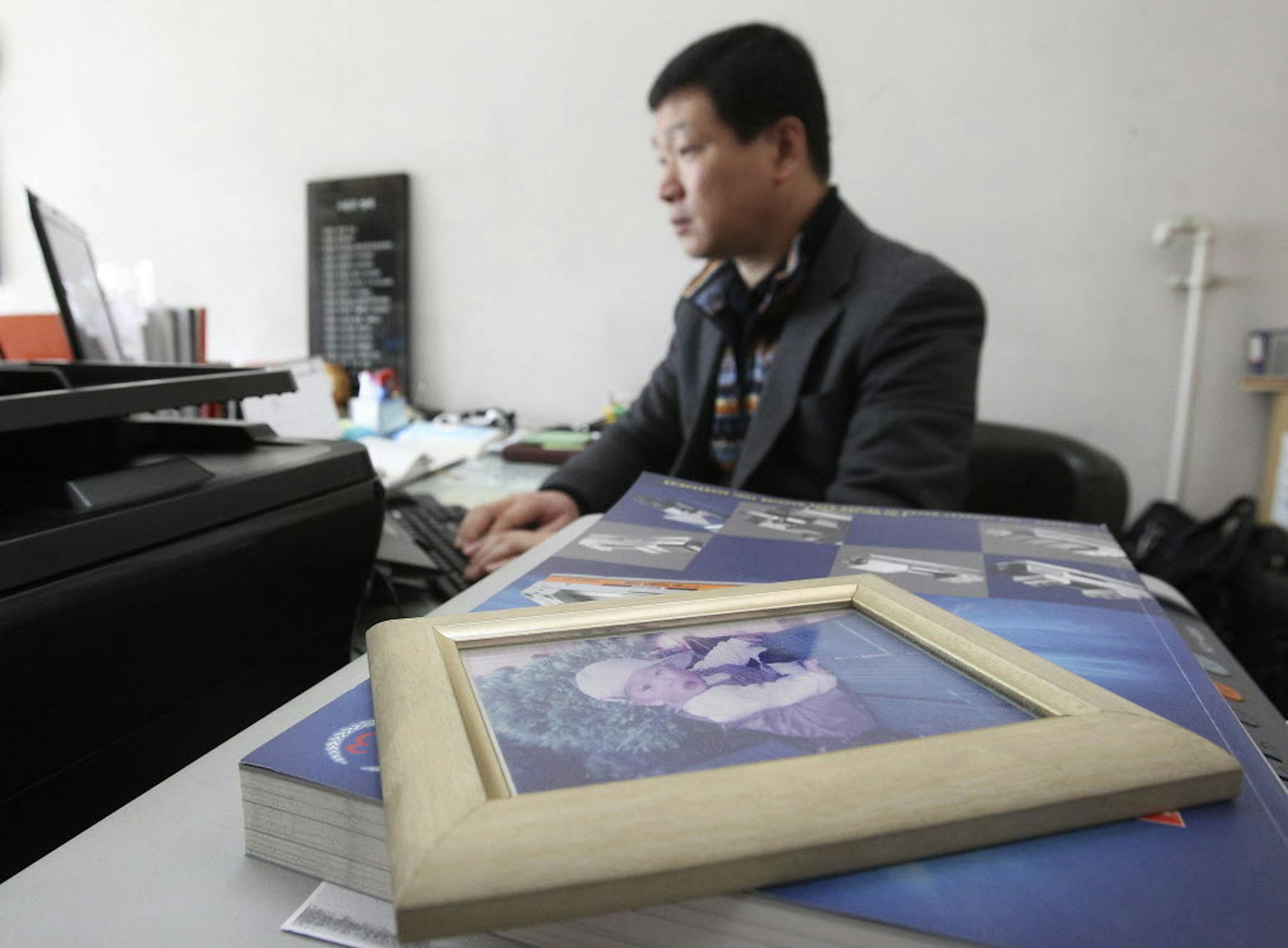 Dec. 23, 2013: Yoo Tae-we, 47, a South Korean manager of a trading company, at work.