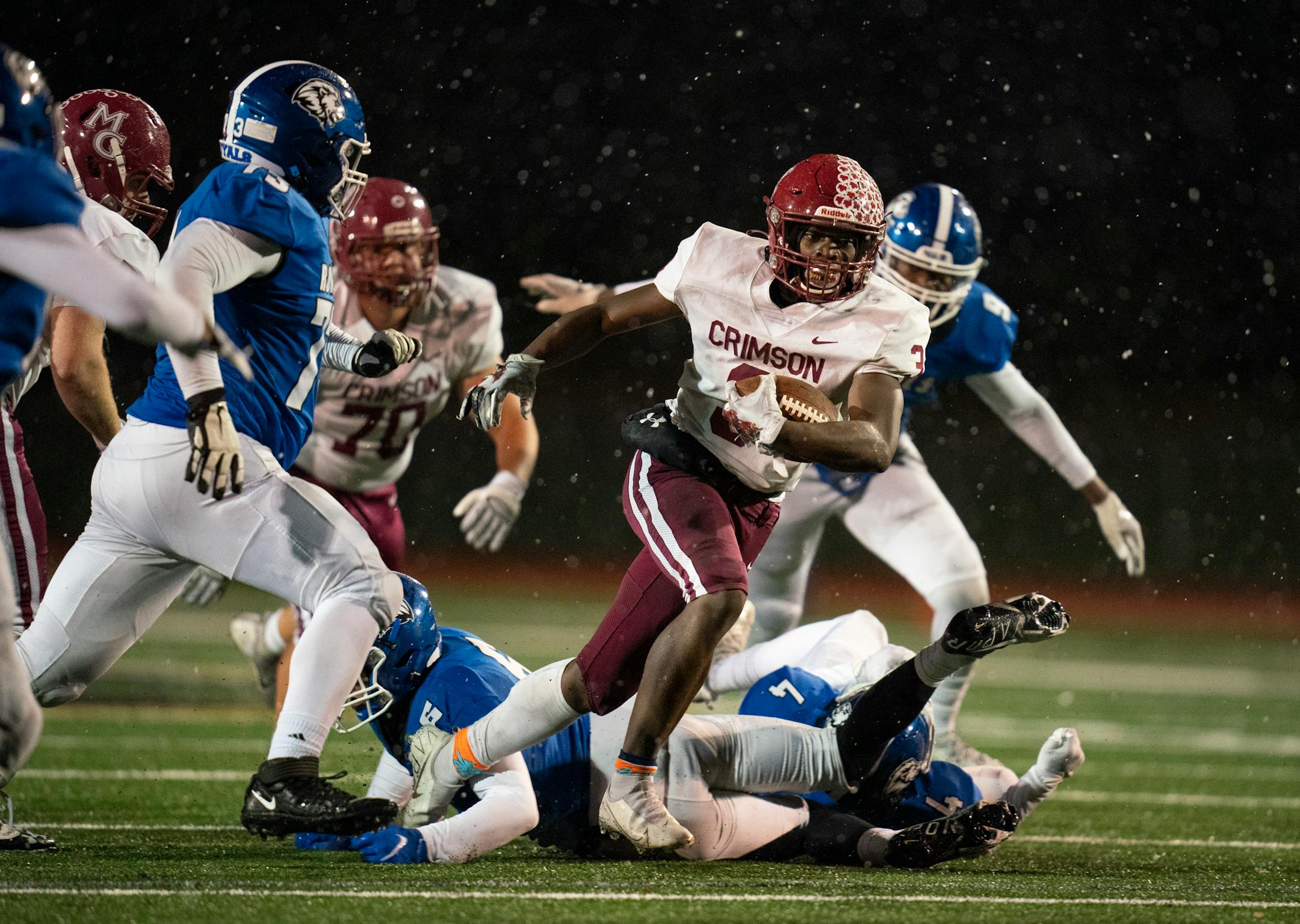 Maple Grove's Derrick Jameson (3) broke free for a seven yard gain and a fourth quarter first down Thursday, Nov. 11, 2021 in Eden Prairie. The Maple Grove Crimson defeated the Woodbury Royals 34-12 in a MSHSL Class 6A football state tournament quarterfinal game Thursday, Nov. 11, 2021 night at Eden Prairie High School in Eden Prairie. ] JEFF WHEELER • Jeff.Wheeler@startribune.com