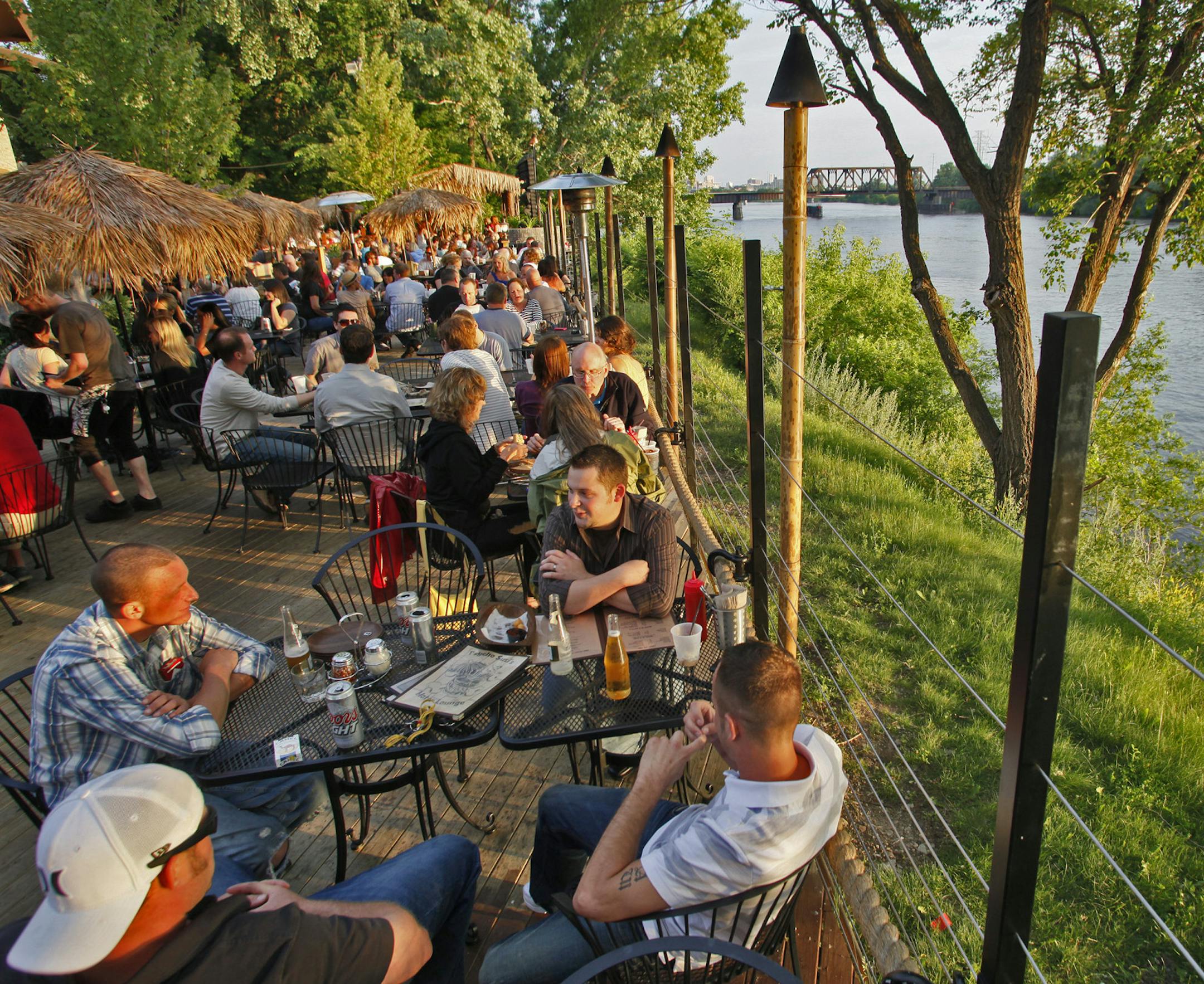 (Marlin Levison*mlevison@startribune.com.) 06/24/2011A&E story on patio bars in the Twin Cities. IN THIS PHOTO: Patio bar at Psycho Suzi's in NE Minneapolis with a view of the Mississippi River.bestmn2012 bestmn2012 ORG XMIT: MIN2013021408510108