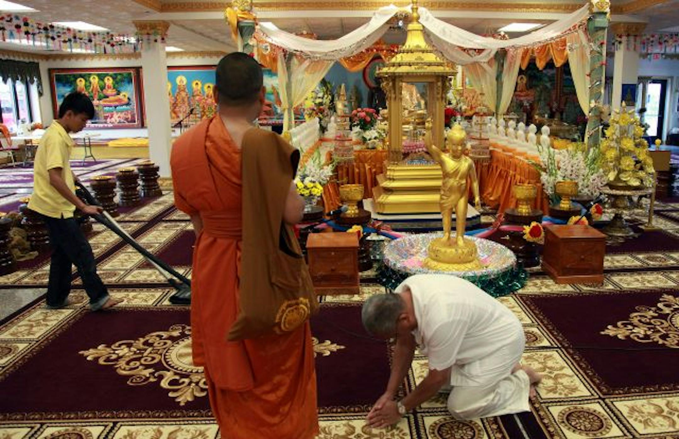 Buddhist Monk Moeng Sang looked over the Relic presentation temple early Friday morning, at the Watt Munisotaram in Hampton that is taking place this weekend to celebrate the arrival of relics of Buddha that will be enshrined there. Monks from Sri Lanka have delivered the relics, and this weekend's "flower festival" at the temple also includes a groundbreaking for a new building on the property in rural Dakota County.