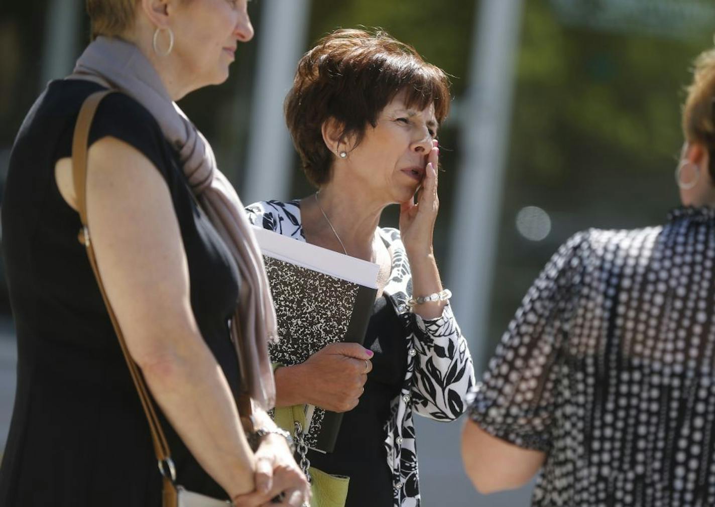 Cheri Ekbom, center, was upset that her nephew did not admit to premeditating the murder of his grandmother during the robbery.