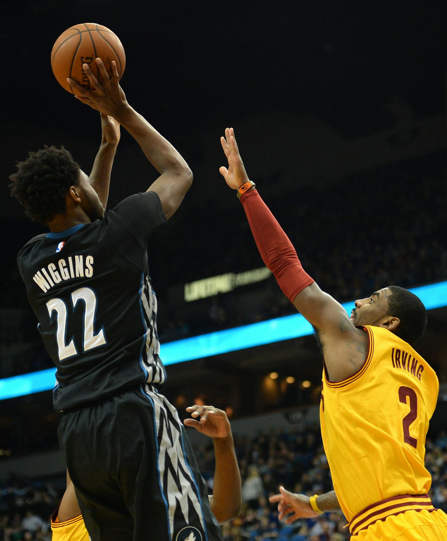 Minnesota Timberwolves guard Andrew Wiggins (22) hit a 2-point jump shot over Cleveland Cavaliers guard Kyrie Irving (2) in the first quarter Friday. ] (AARON LAVINSKY/STAR TRIBUNE) aaron.lavinsky@startribune.com The Minnesota Timberwolves played the Cleveland Cavaliers on Friday, Jan. 8, 2016 at Target Center in Minneapolis, Minn.