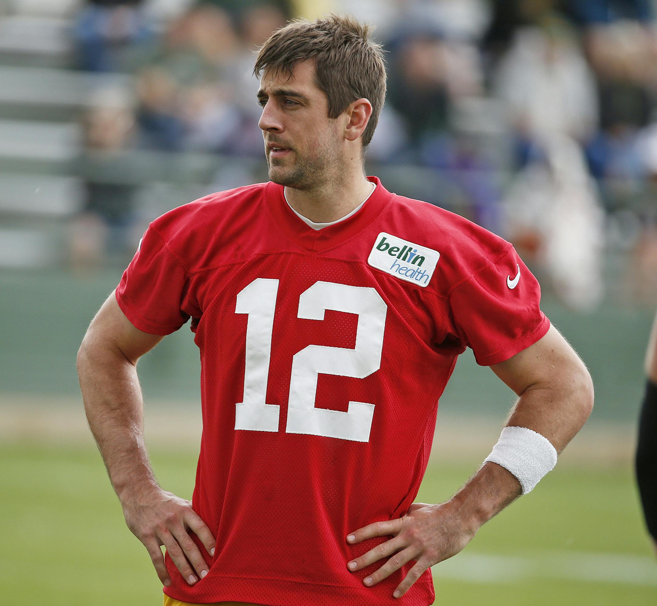 Green Bay Packers quarterback Aaron Rodgers stretches during an NFL football practice Monday June 6, 2016, in Green Bay, Wis. (AP Photo/Matt Ludtke)