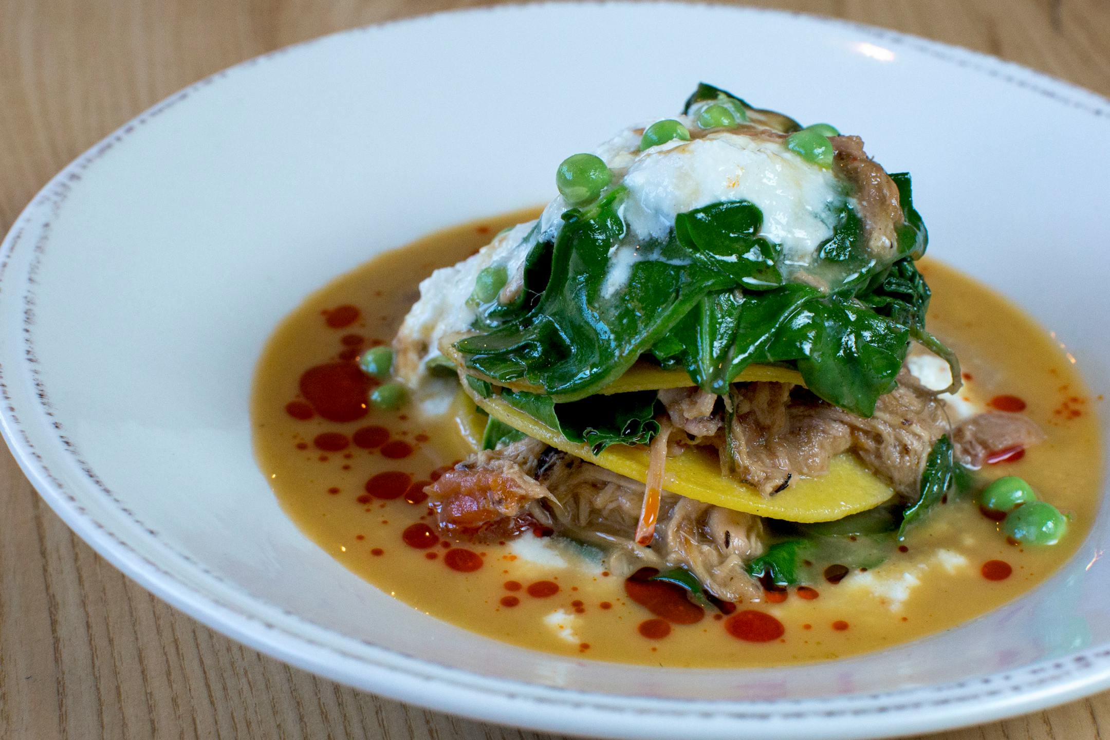 Driftless Cafe serves housemade pasta with chard and rabbit. 85% of the food budget is spent on farms within a 30 mile radius, according to Luke Zahm. ] COURTNEY PEDROZA • courtney.pedroza@startribune.com June 22-24, 2017; Wisconsin restaurants, cafes, bars, bakeries and breweries; Dining along the Mississippi River.