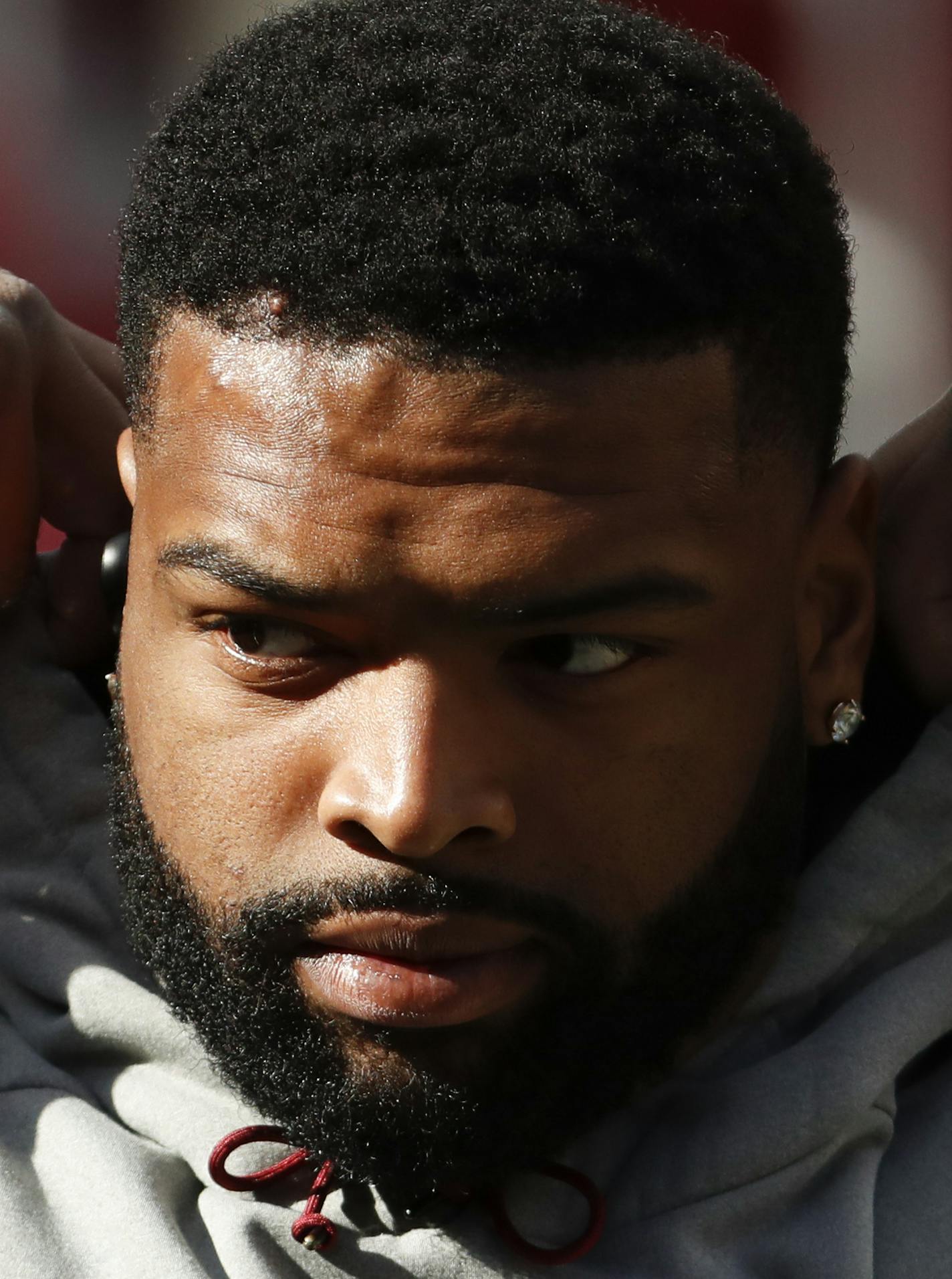 FILE - In this Oct. 21, 2018, file photo, Washington Redskins offensive tackle Trent Williams takes the field for warm ups before an NFL football game against the Dallas Cowboys, in Landover, Md. The agent for Trent Williams says he would like the Washington Redskins to trade or release their longtime starting left tackle. Agent Vince Taylor sent a statement with the request to the Associated Press on Tuesday, March 24, 2020. Taylor says the relationship between Williams and the team had reached