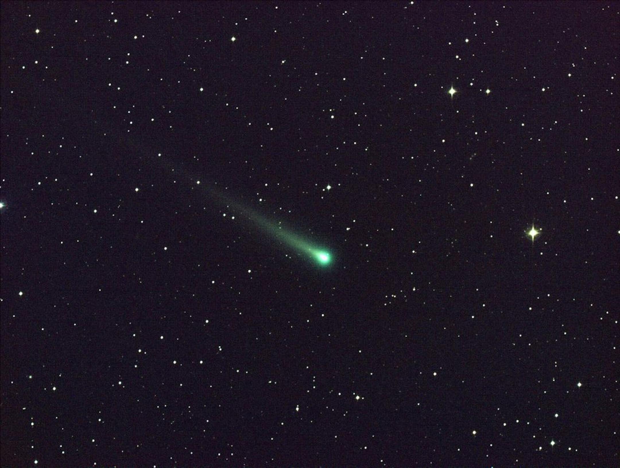 In this photo provided by NASA, Comet ISON shines in this five-minute exposure taken at NASA's Marshall Space Flight Center on Nov. 8 at 5:40 a.m. EST. At the time of this picture, Comet ISON was 97 million miles from Earth, heading toward a close encounter with the sun on Nov. 28. Located in the constellation of Virgo, it is now visible in a good pair of binoculars.