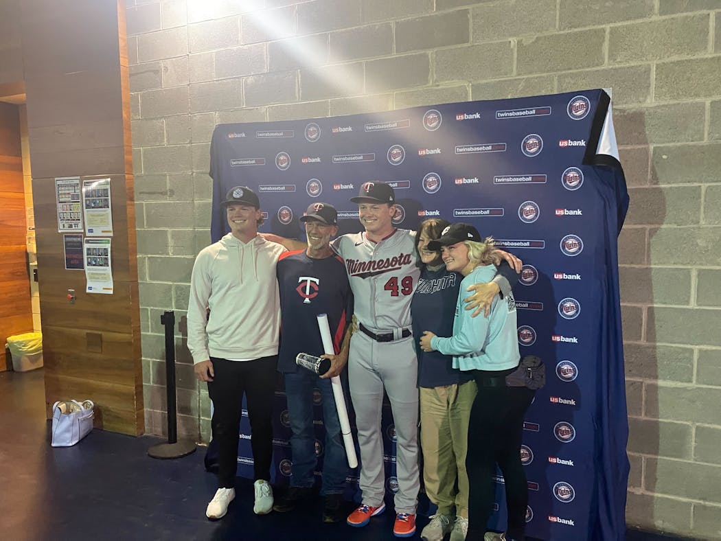 Louie Varland gathered with his family for a photo at Yankee Stadium on Wednesday, when he made his major league pitching debut.