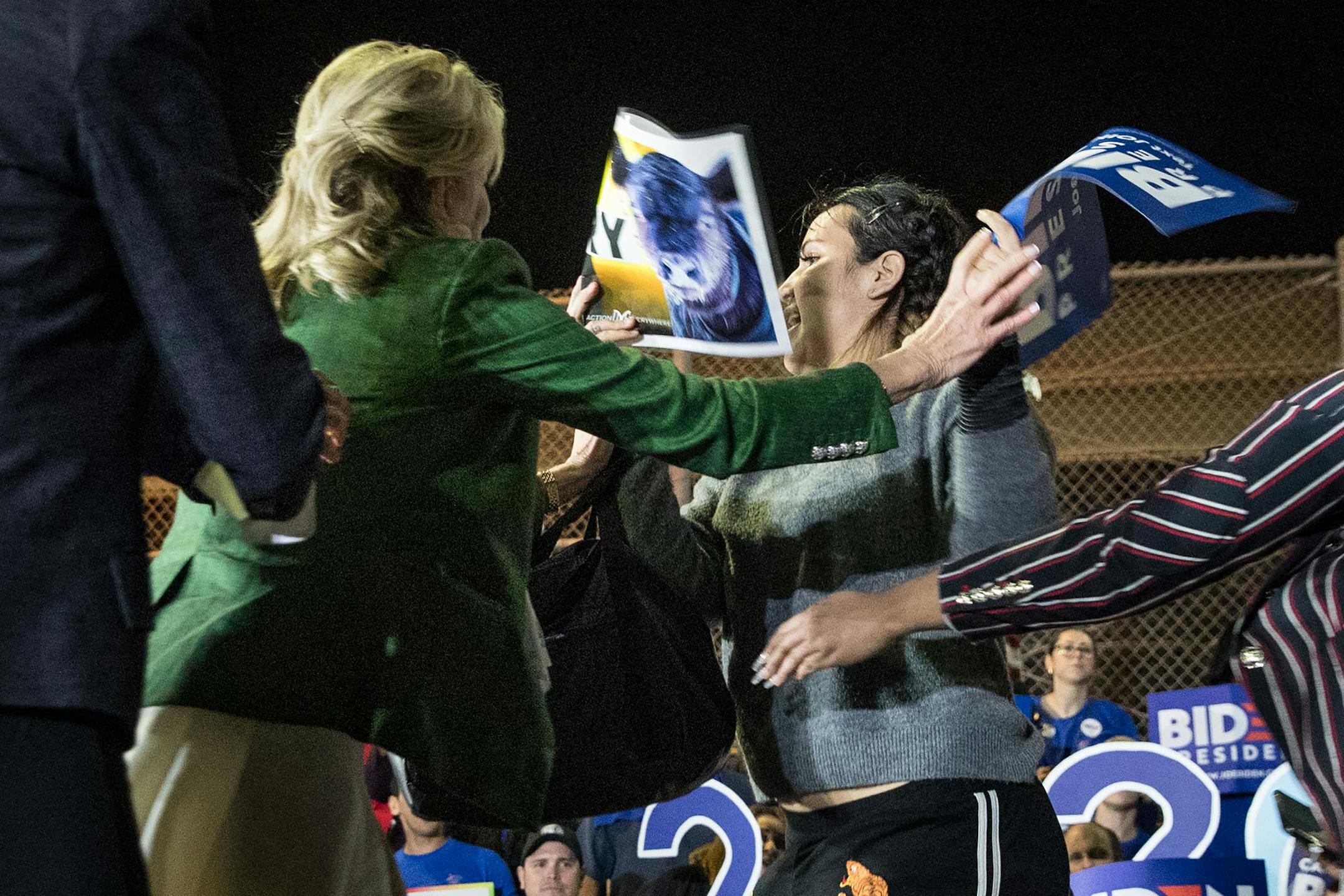 Jill Biden defends her husband, former Vice President Joe Biden, a Democratic presidential candidate, from a protester against the dairy industry, during a campaign event in Los Angeles, during Super Tuesday, on March 3, 2020. A coalition of activists determined to end the dairy industry have been using the Democratic primaries to get attention. (Josh Haner/The New York Times)