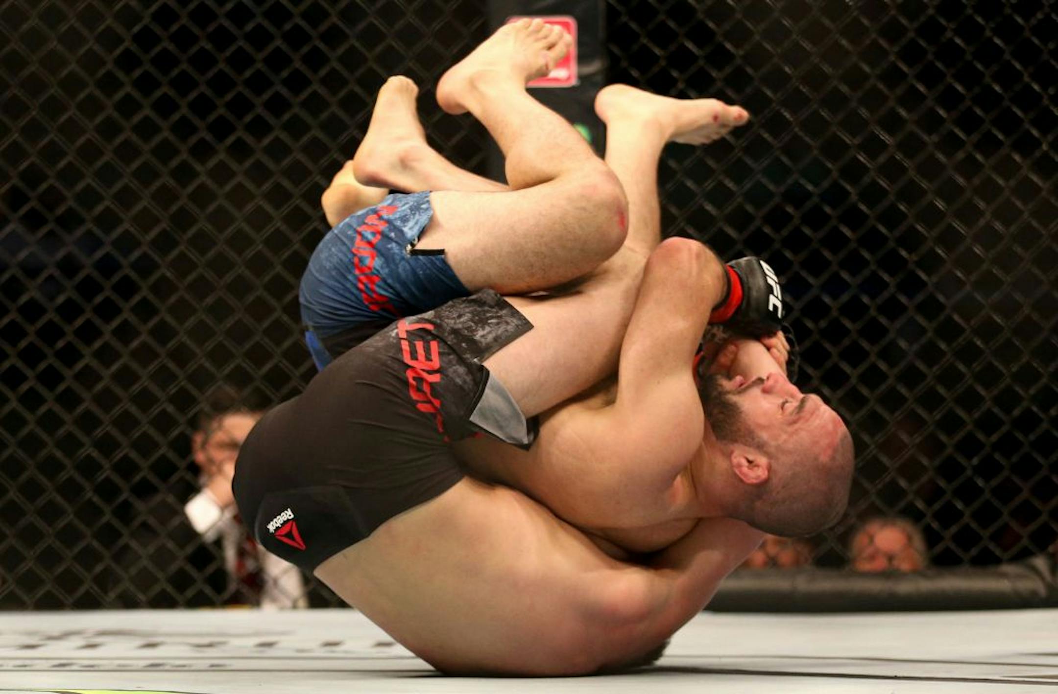 Dan Moret and Jared Gordon battle for control on the floor. Gordon would go on to win the match by unanimous decision. ALEX KORMANN ¥ alex.kormann@startribune.com UFC Fight Night was held at Target Center on Saturday June 29, 2019. Francis Ngannou and Junior Dos Santos headlined the event.