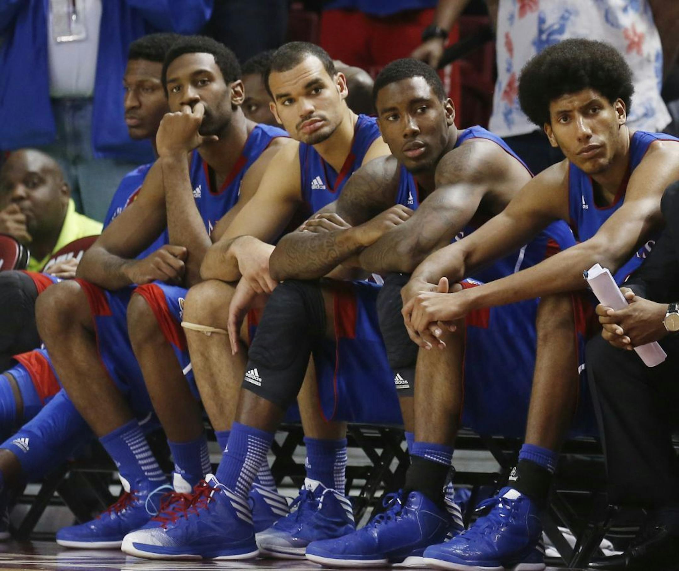 Kansas players watch from the bench against Oklahoma.