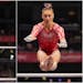 Suni Lee and Grace McCallum competed on the uneven bars during Sunday’s Olympic trials.