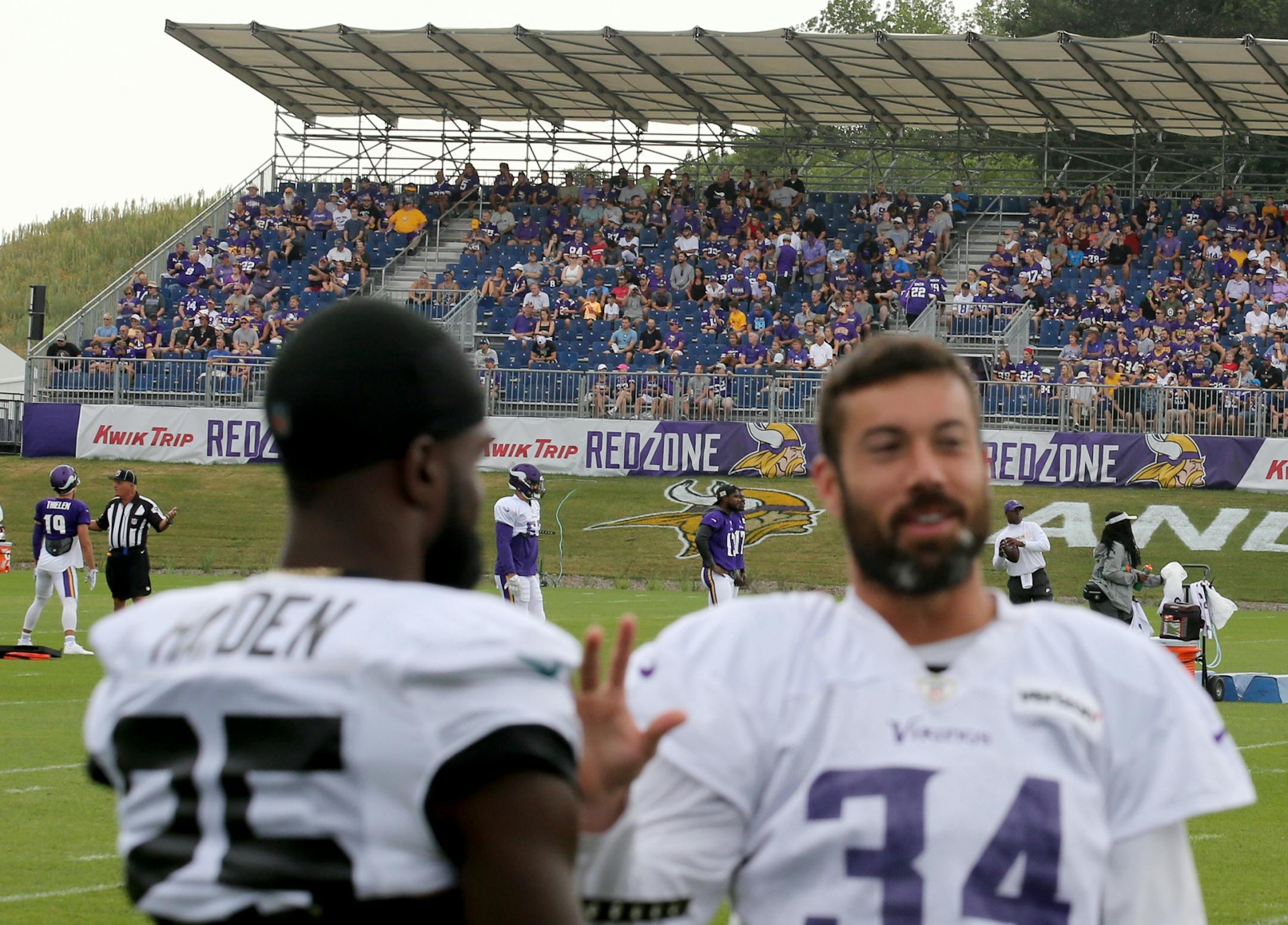 The Minnesota Vikings Andrew Sendejo (34) chats with opposition players before the start of a Vikings and Jacksonville Jaguars joint practice session as fans look on Thursday, Aug. 16, 2018, at the TCO Performance Center in Eagan, MN.