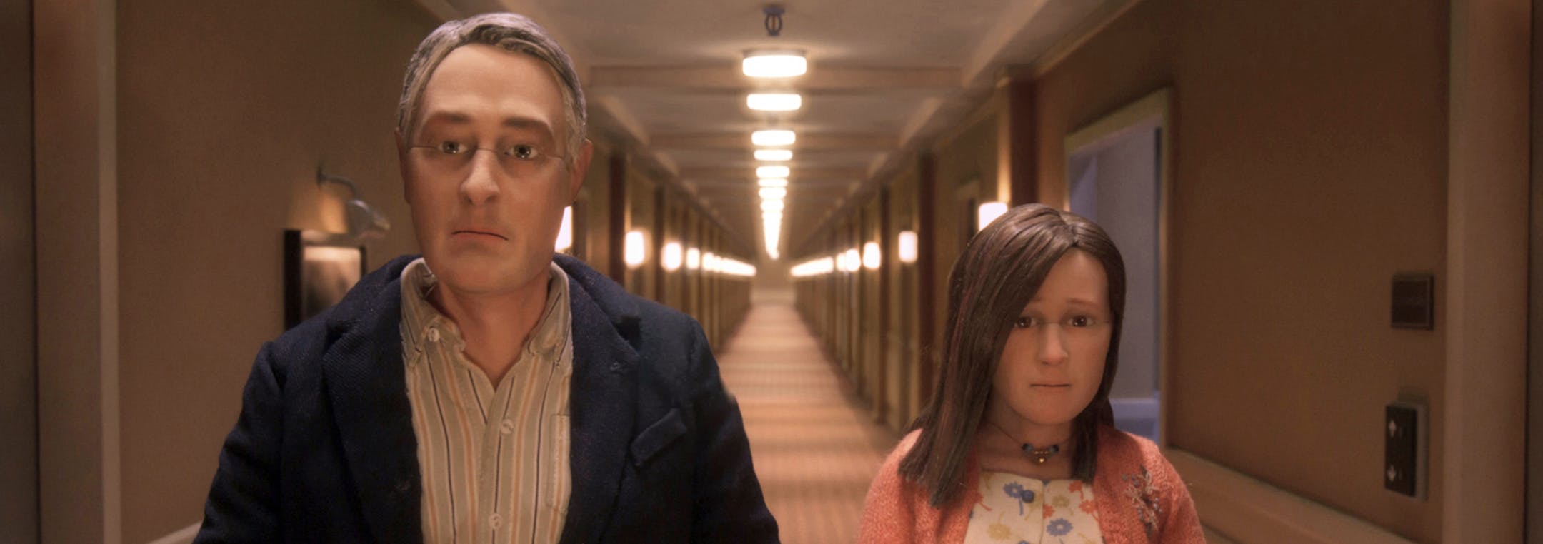 This photo provided by Paramount Pictures shows, David Thewlis voices Michael Stone, left, and Jennifer Jason Leigh voices Lisa Hesselman, in the animated stop-motion film, "Anomalisa," by Paramount Pictures. The film opens in U.S. theaters in Jan. 2016. (Paramount Pictures via AP)