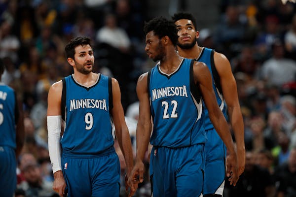 From left, Minnesota Timberwolves guard Ricky Rubio (9), forward Andrew Wiggins (22) and center Karl-Anthony Towns (32)