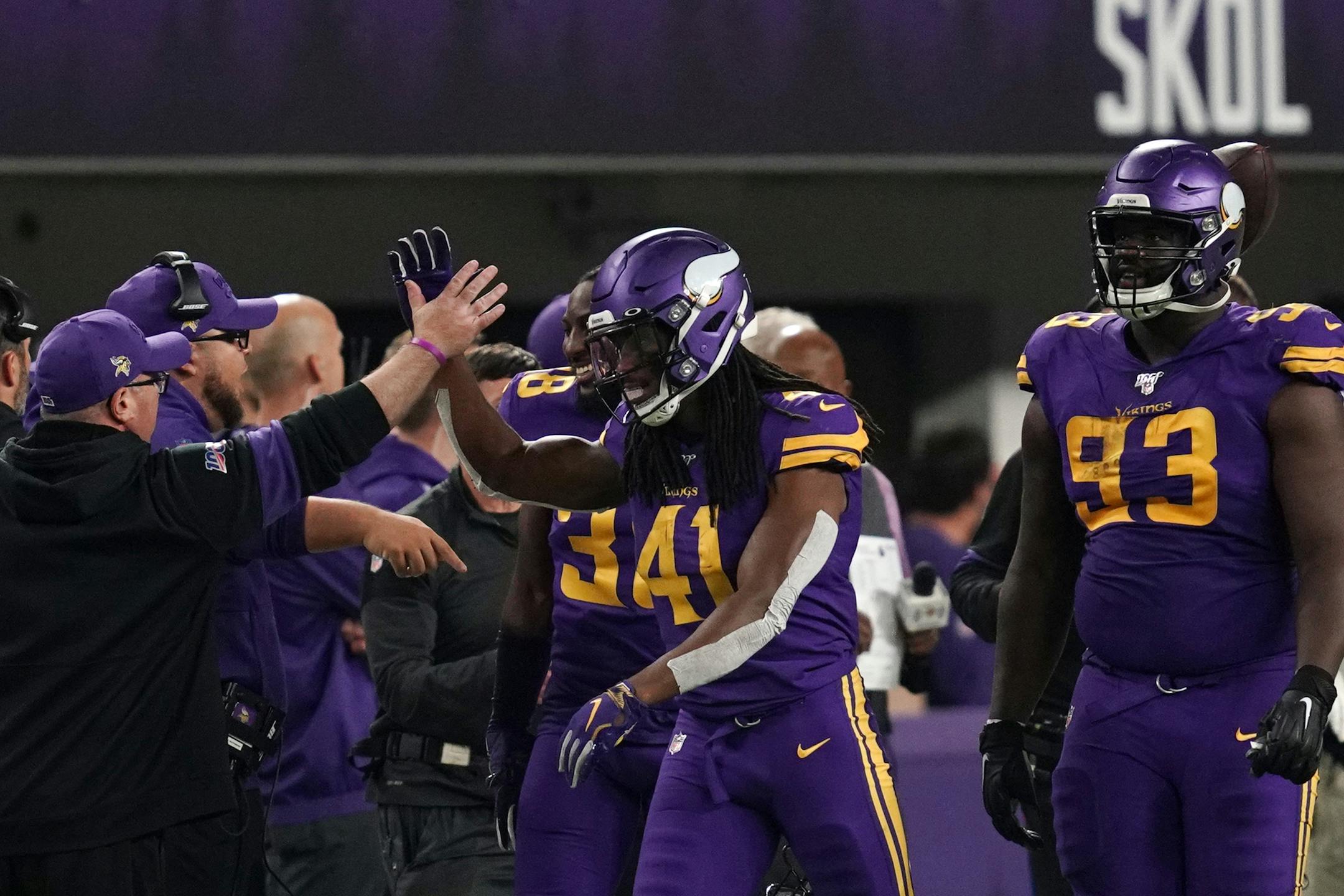Vikings defensive back Anthony Harris was congratulated by his teammates after he made an interception in the third quarter.