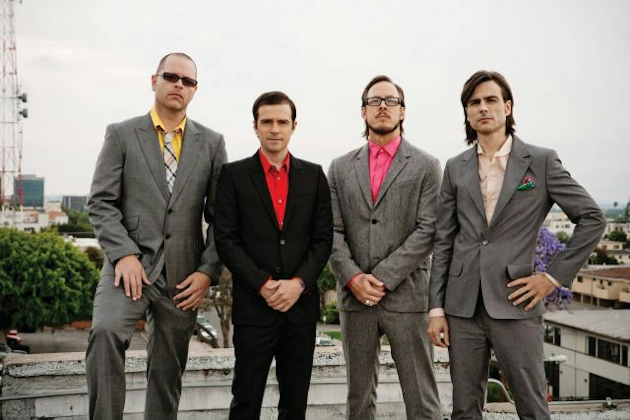 Rivers Cuomo (second from left) and Weezer swing from silly to serious.