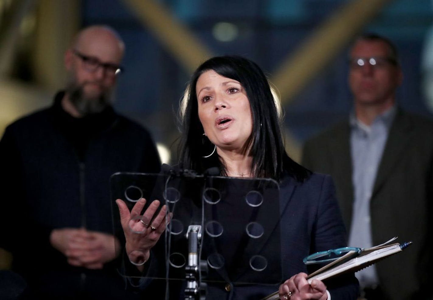 Jodi Wentland, Hennepin County Assistant County Administrator, Human Services, spoke during a press conference at the Hennepin County Government Center Friday, Dec. 27, 2019, in downtown Minneapolis, MN. To her rear are Rev. Dan Collison of First Covenant Church of Minneapolis, left, and Ken Currie, Lead Pastor at Bethlehem Baptist Church, right.