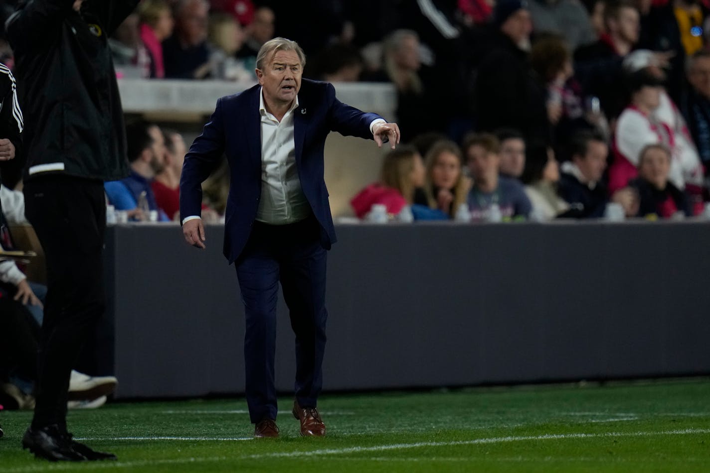 Minnesota United head coach Adrian Heath watched from the sidelines during a game earlier this month.