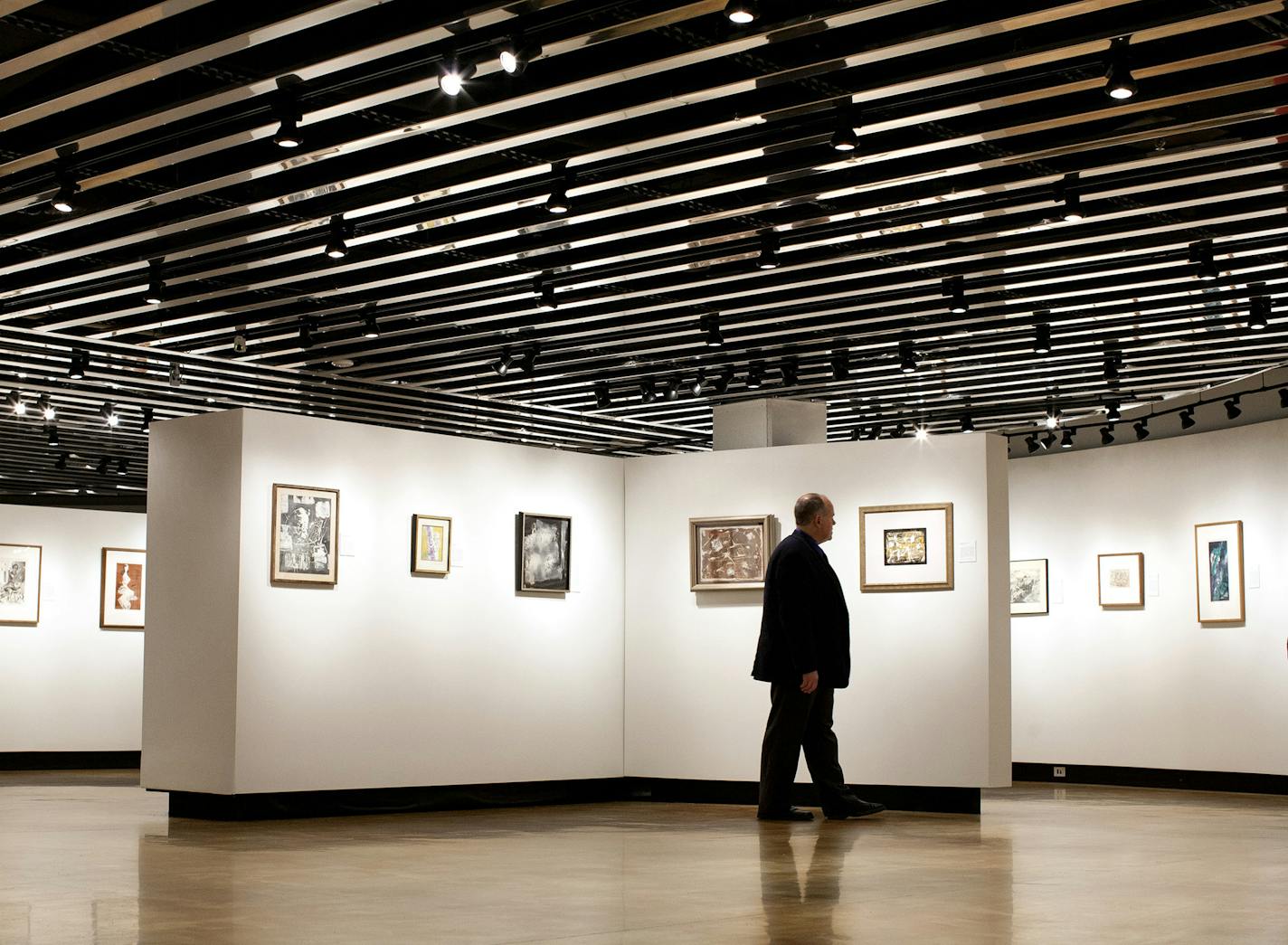 Museum Director Donald Myers walks through the Hillstrom Museum of Art at Gustavus Adolphus College in St. Peter, Minnesota, April 20, 2014. (Courtney Perry/Special to the Star Tribune)