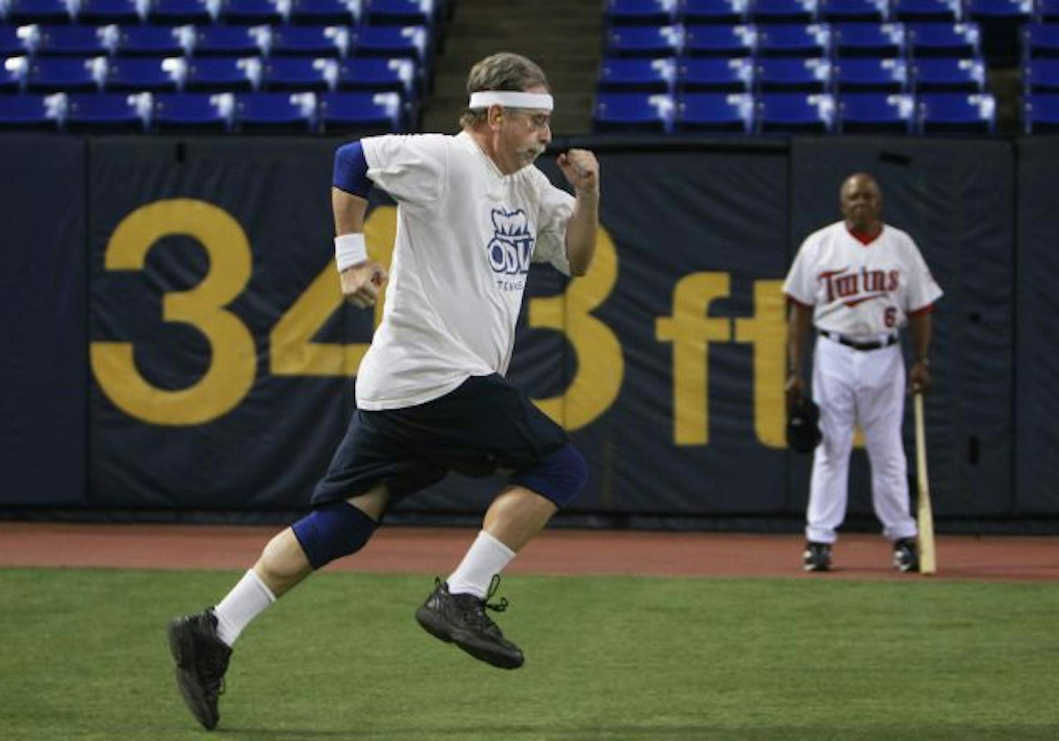 At the Twins open tryouts at the Metrodome, John Wooldridge, a 55-year-old teacher from Northfolk, Va., ran 90 yards in front of Twins legend Tony Oliva. "That is the most I have run in a while," says Wooldridge who has no illusions about making it as an infielder.