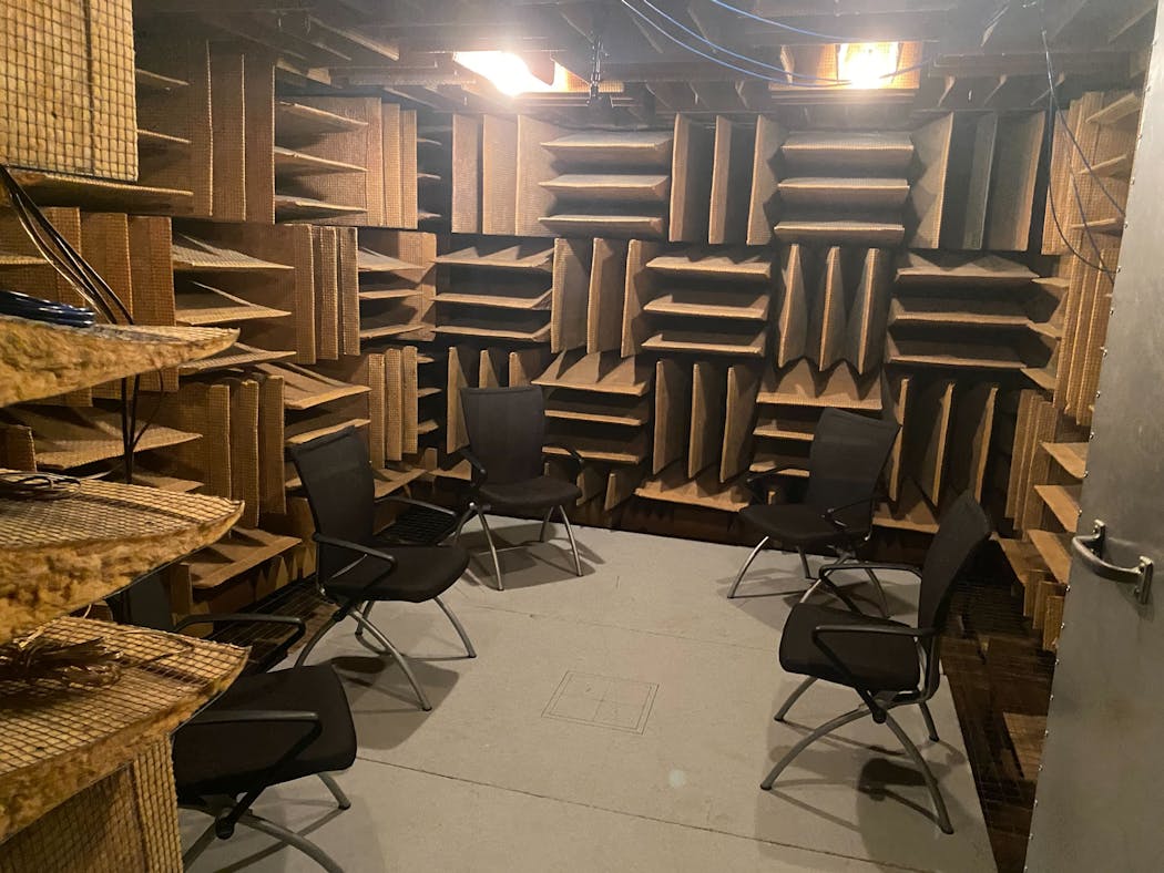 The anechoic chamber at Orfield Labs is 8 by 10 by 12 feet. Office chairs were placed inside for the group tour.