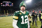 Green Bay Packers' Aaron Rodgers walks off the field after an NFL football game against the Detroit LionsSunday, Jan. 8, 2023, in Green Bay, Wis. (AP 