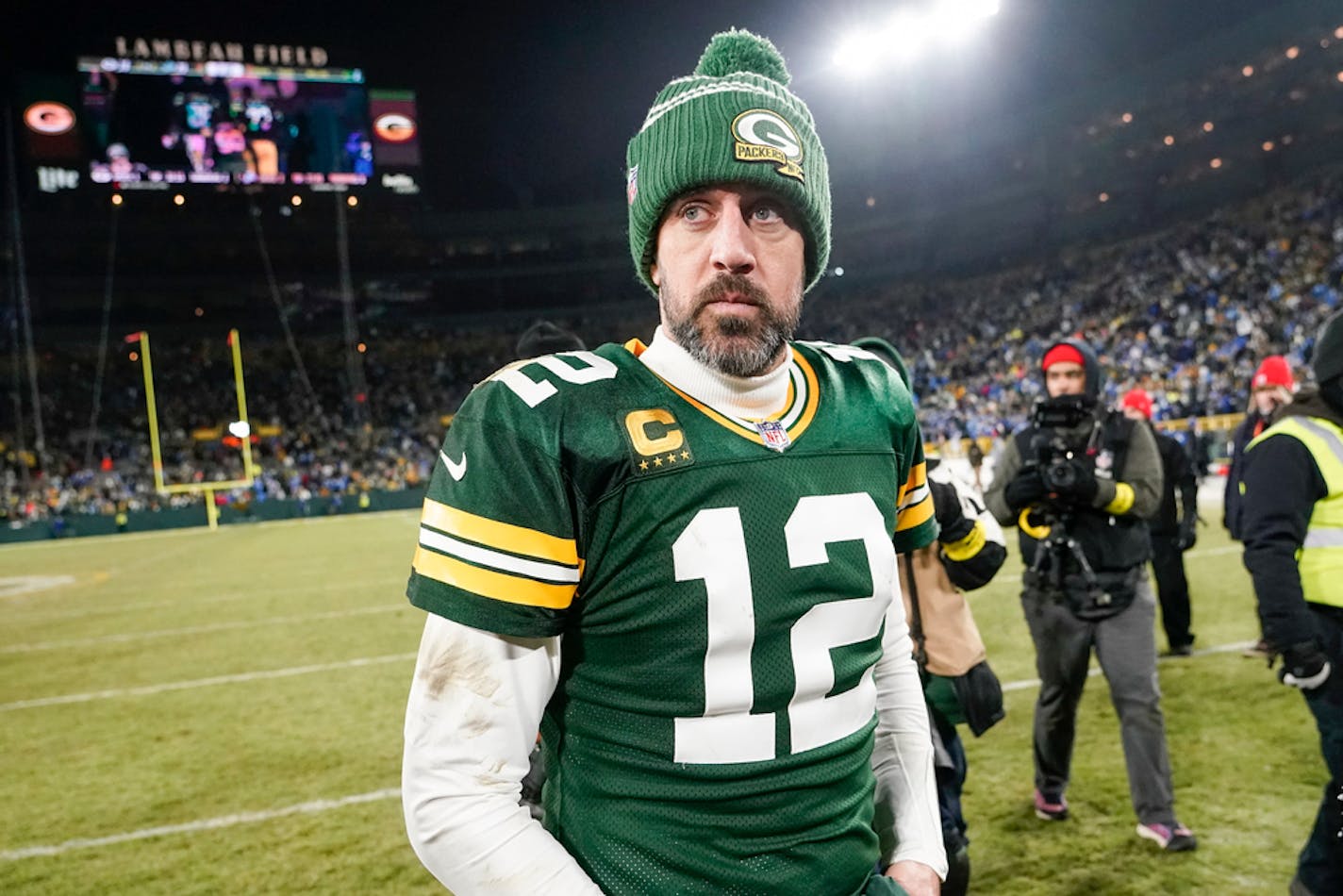 Green Bay Packers' Aaron Rodgers walks off the field after an NFL football game against the Detroit LionsSunday, Jan. 8, 2023, in Green Bay, Wis. (AP Photo/Morry Gash)