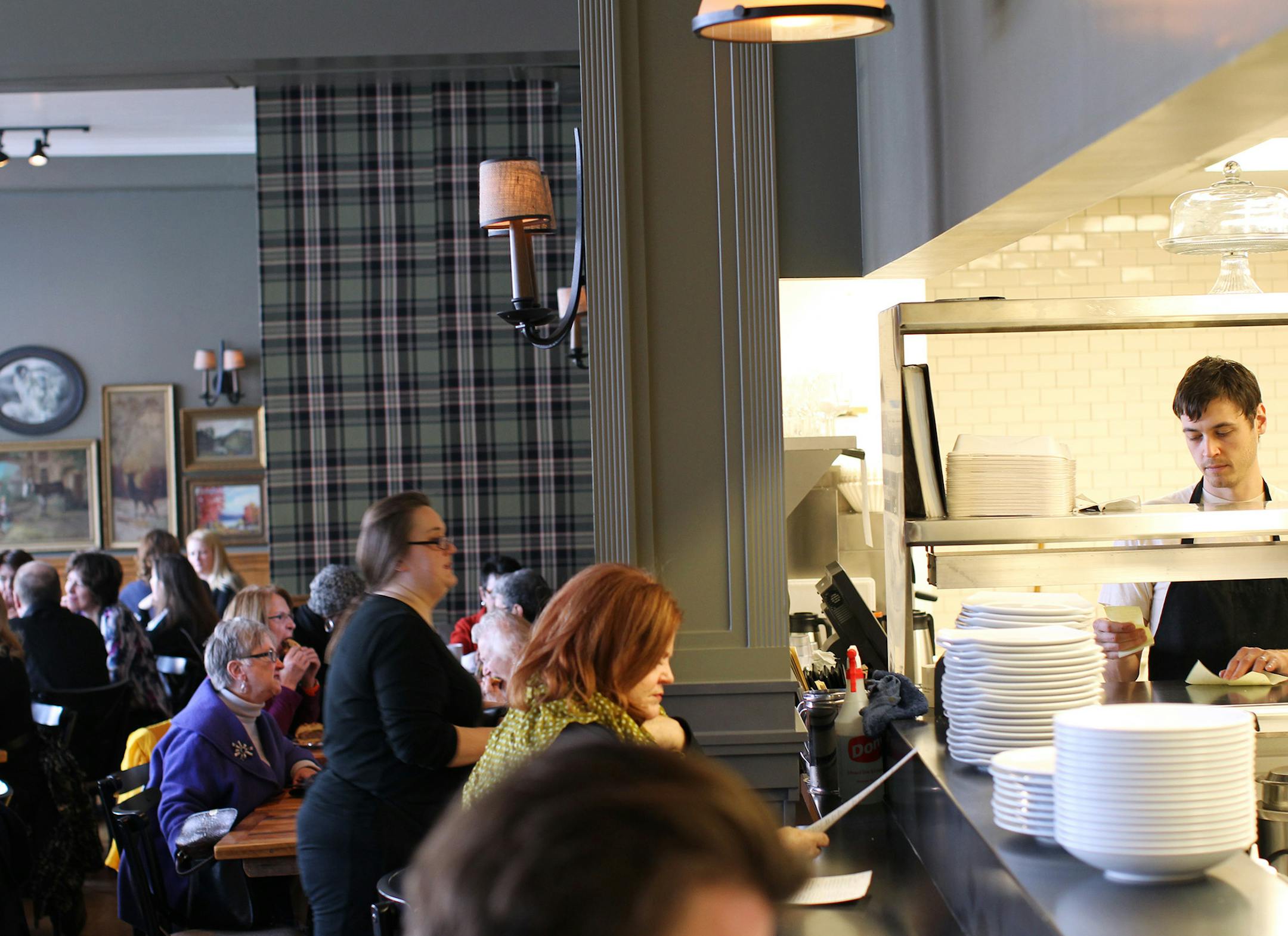 Diners can see into and sit by the open kitchen at The Kenwood restaurant in Minneapolis November 14, 2012. (Courtney Perry/Special to the Star Tribune)