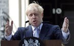 FILE - In this file photo dated Wednesday, July 24, 2019, Britain's newly installed Prime Minister Boris Johnson gestures as he speaks outside 10 Down