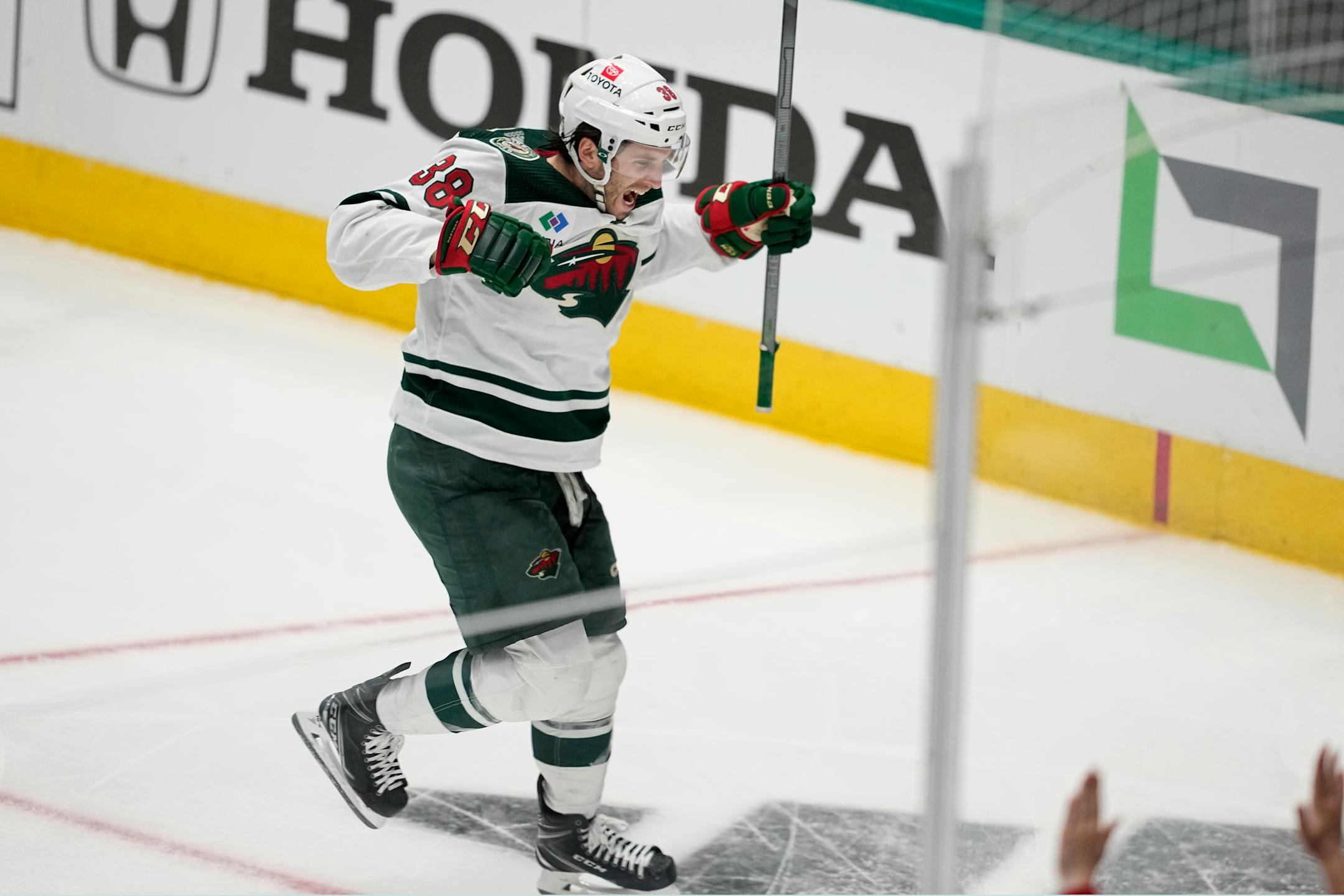 Minnesota Wild right wing Ryan Hartman (38) celebrates after scoring in the second overtime of Game 1.
