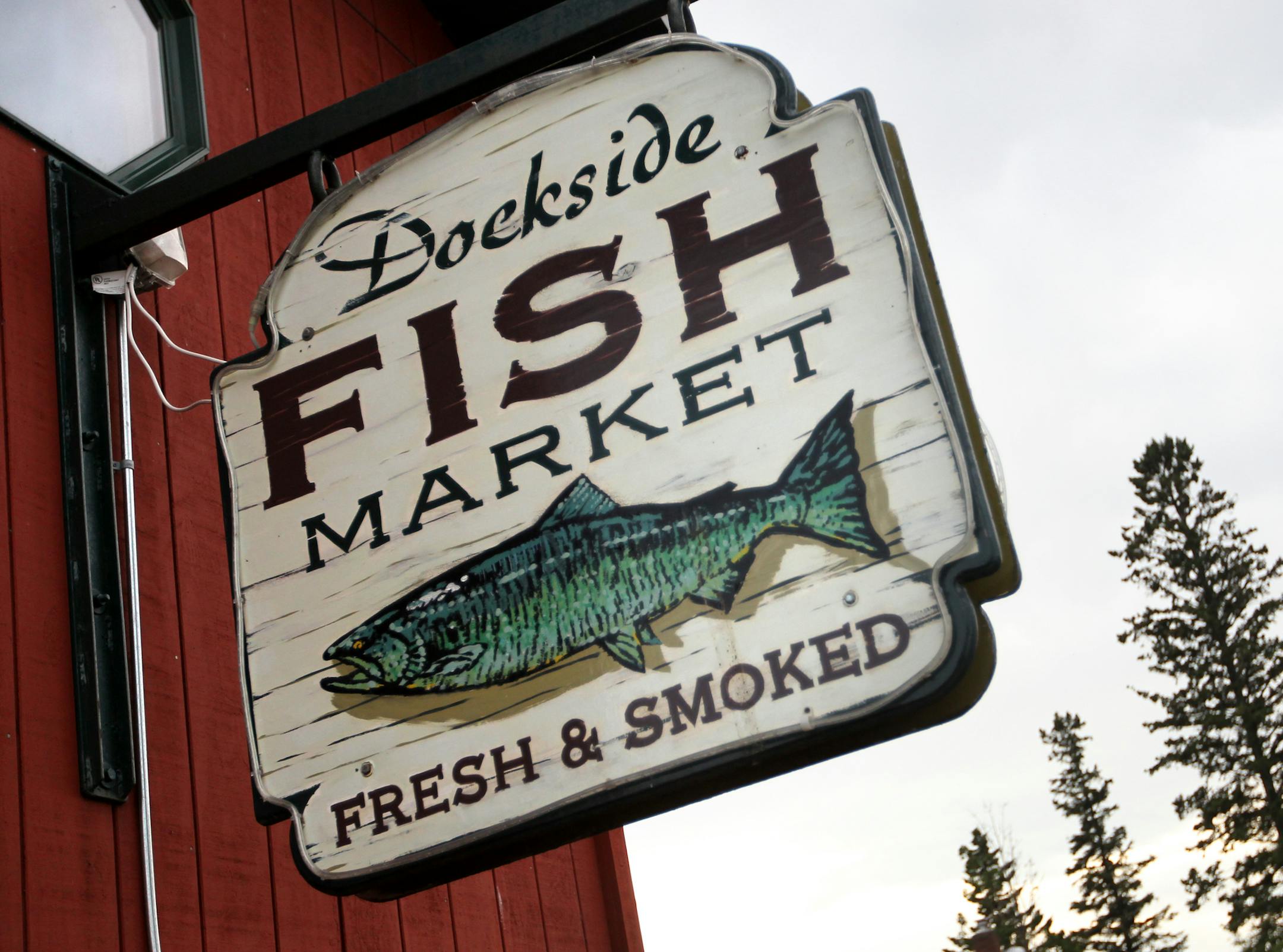The dockside Fish Market signage__Food writer Rick Nelson makes his annual trip to parts of Minnesota we might want to go. This year it‚Äôs the North Shore, From Duluth to past Grand Maria, which brought us a good mix of people, settings and food, starting in Duluth and headed north as far as the Naniboujou Lodge. [ TOM WALLACE ‚Ä¢ twallace@startribune.com _ Assignments #20024190A_ June 27, 2011_ SLUG: northshore0712_ EXTRA INFORMATION: