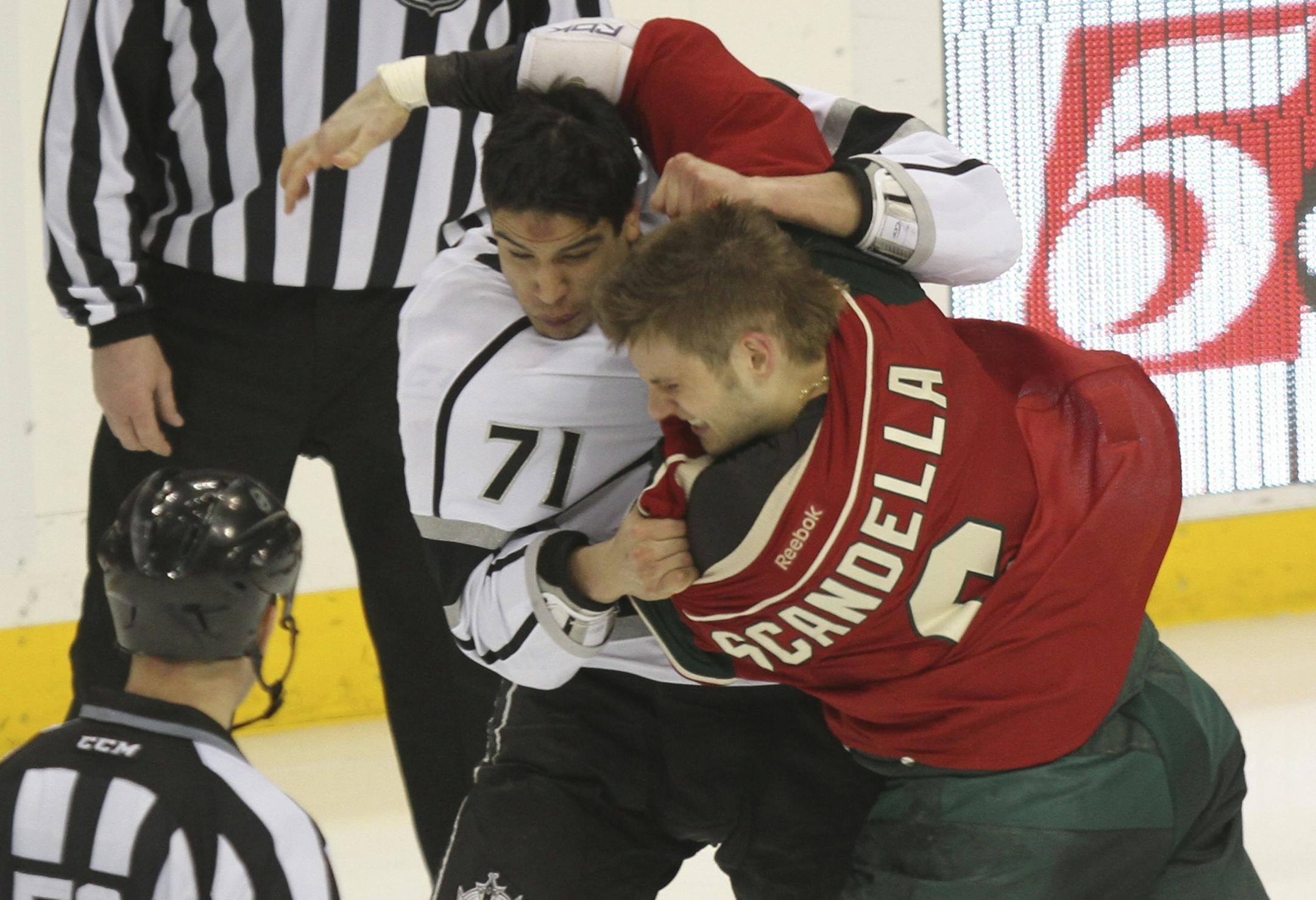The Wild's Marco Scandella and the Kings' Jordan Nolan fought near center ice during the third period at Xcel Energy Center on February 28, 2012.