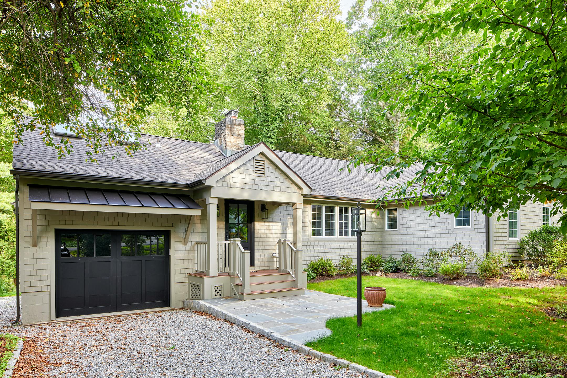Ranch style home with front-facing garage.