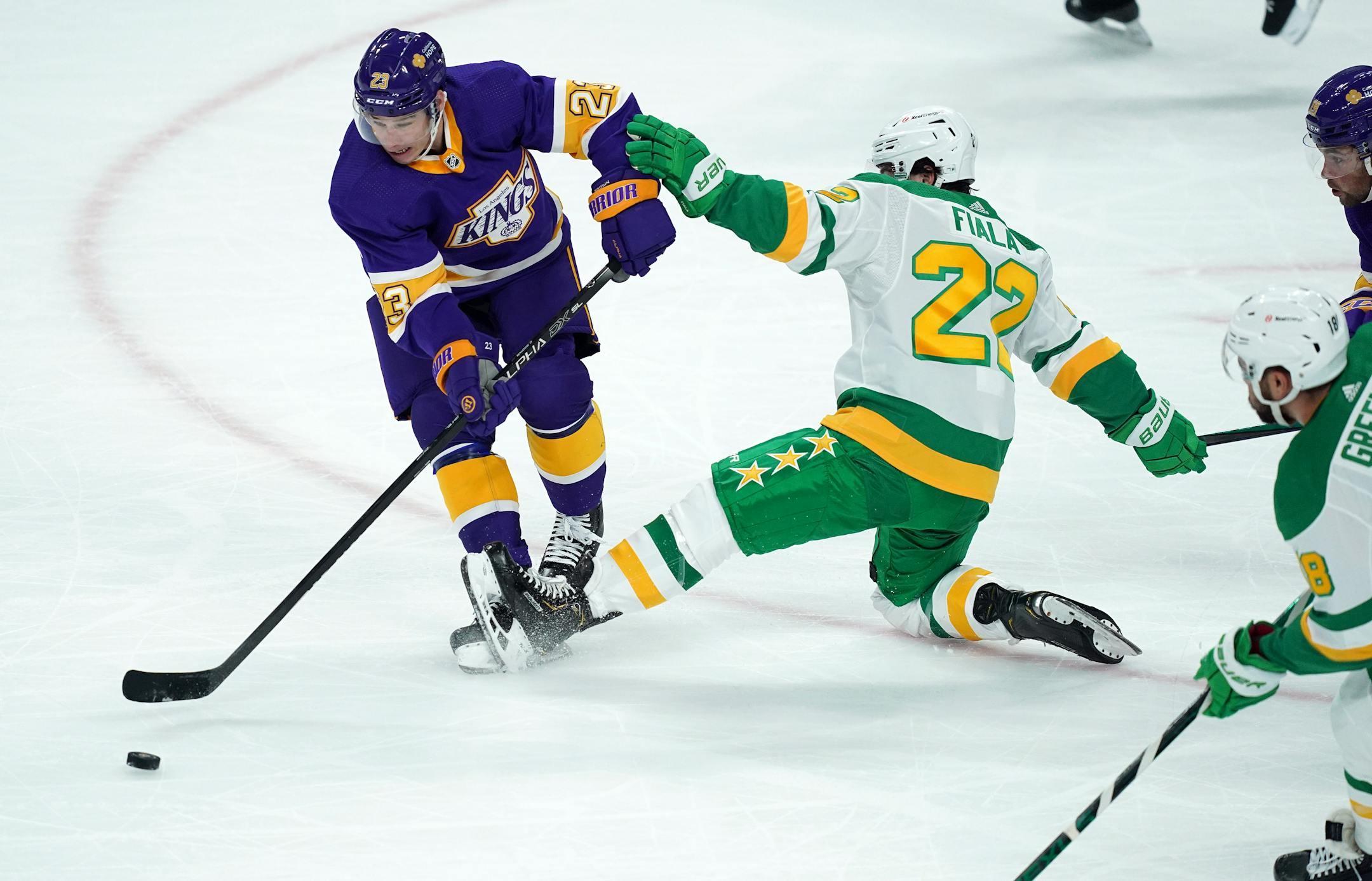 Minnesota Wild left wing Kevin Fiala stuck his leg out to block Los Angeles Kings right wing Dustin Brown in the first period.
