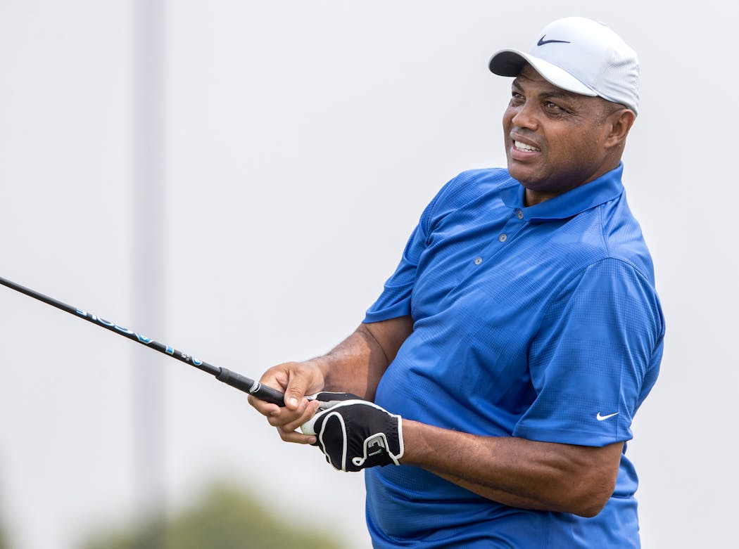 NBA analyst Charles Barkley grimaced as he watched his tee shot on the first hole during a Pro-Am at the 3M Open in Blaine on Wednesday.