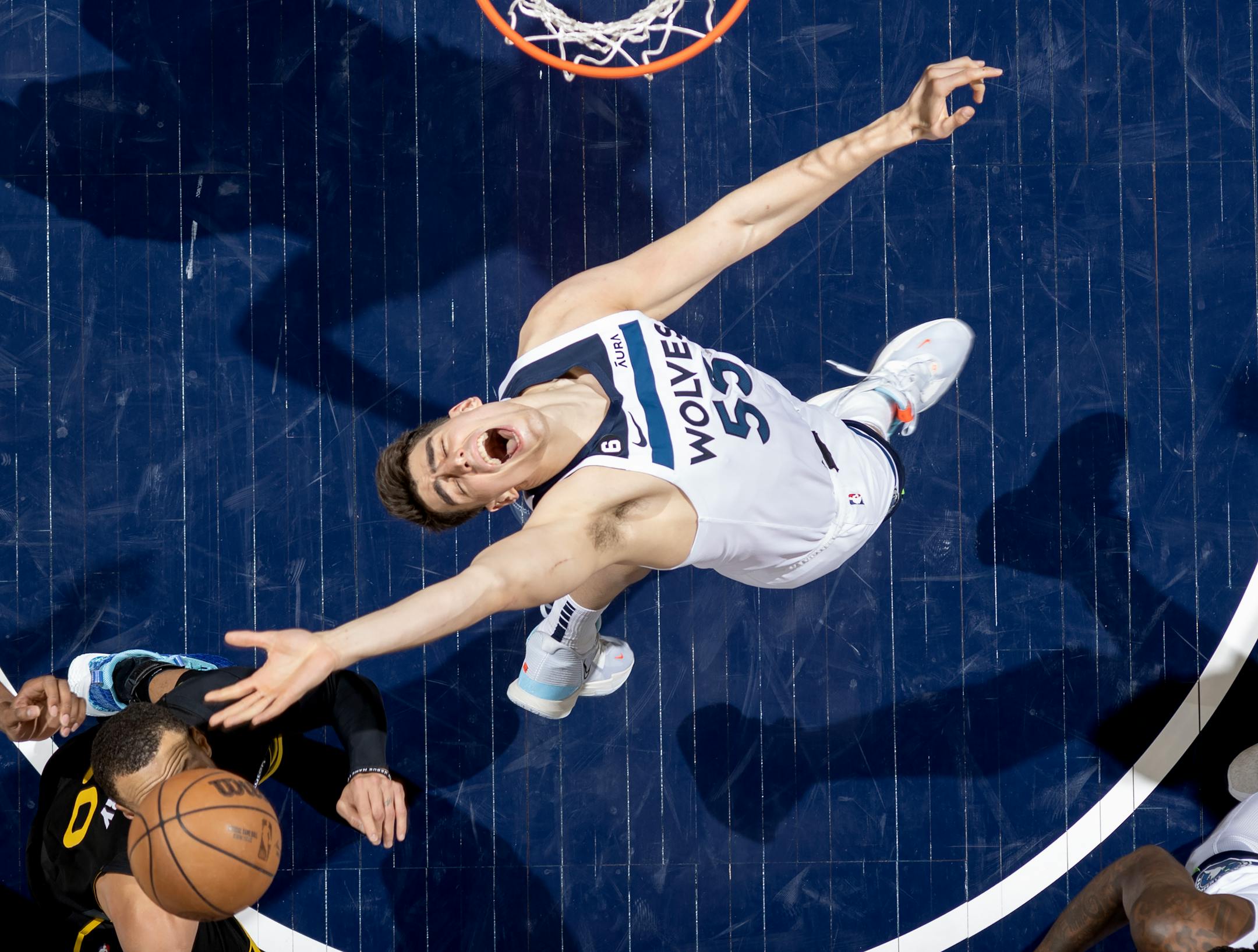 Luke Garza (55) of the Minnesota Timberwolves reaches for the ball in the second half Wednesday, February 1, 2023, at Target Center in Minneapolis, Minn. ] CARLOS GONZALEZ • carlos.gonzalez@startribune.com.